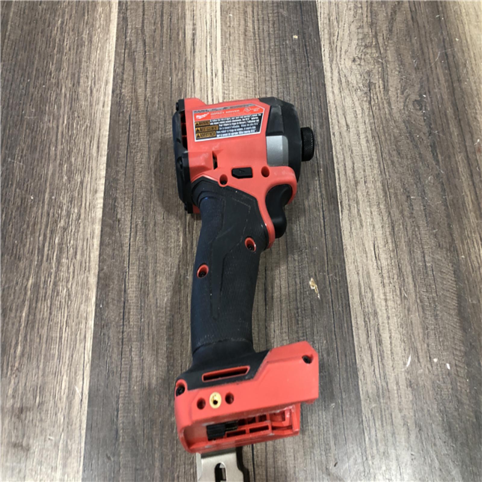 AS-IS Milwaukee  FUEL 18V Lithium-Ion Brushless Cordless 1/4 in. Hex Impact Driver (Tool-Only)
