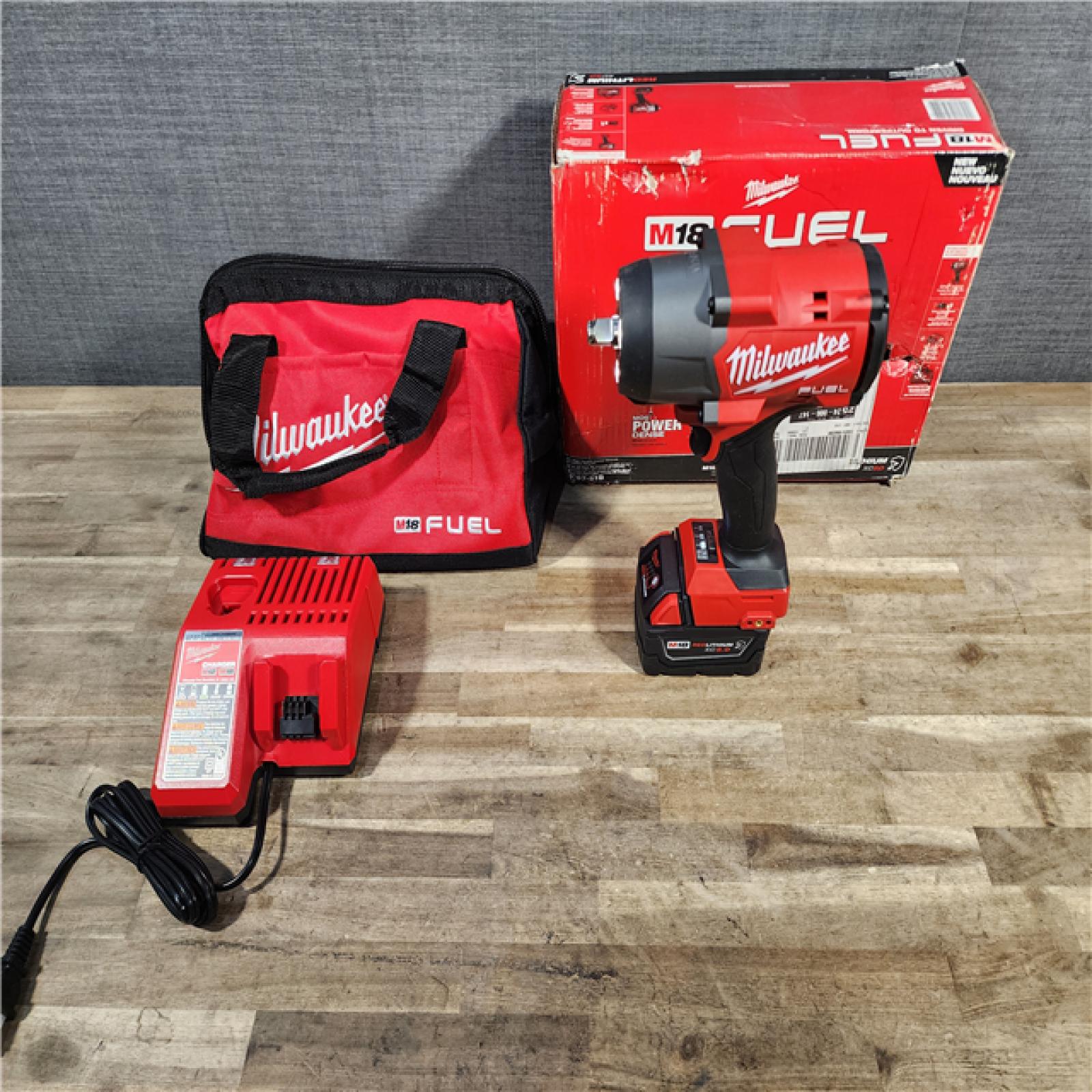 HOUSTON LOCATION - AS-IS Milwaukee M18 1/2 in. Cordless Brushless High Torque Impact Wrench Kit (Battery & Charger)