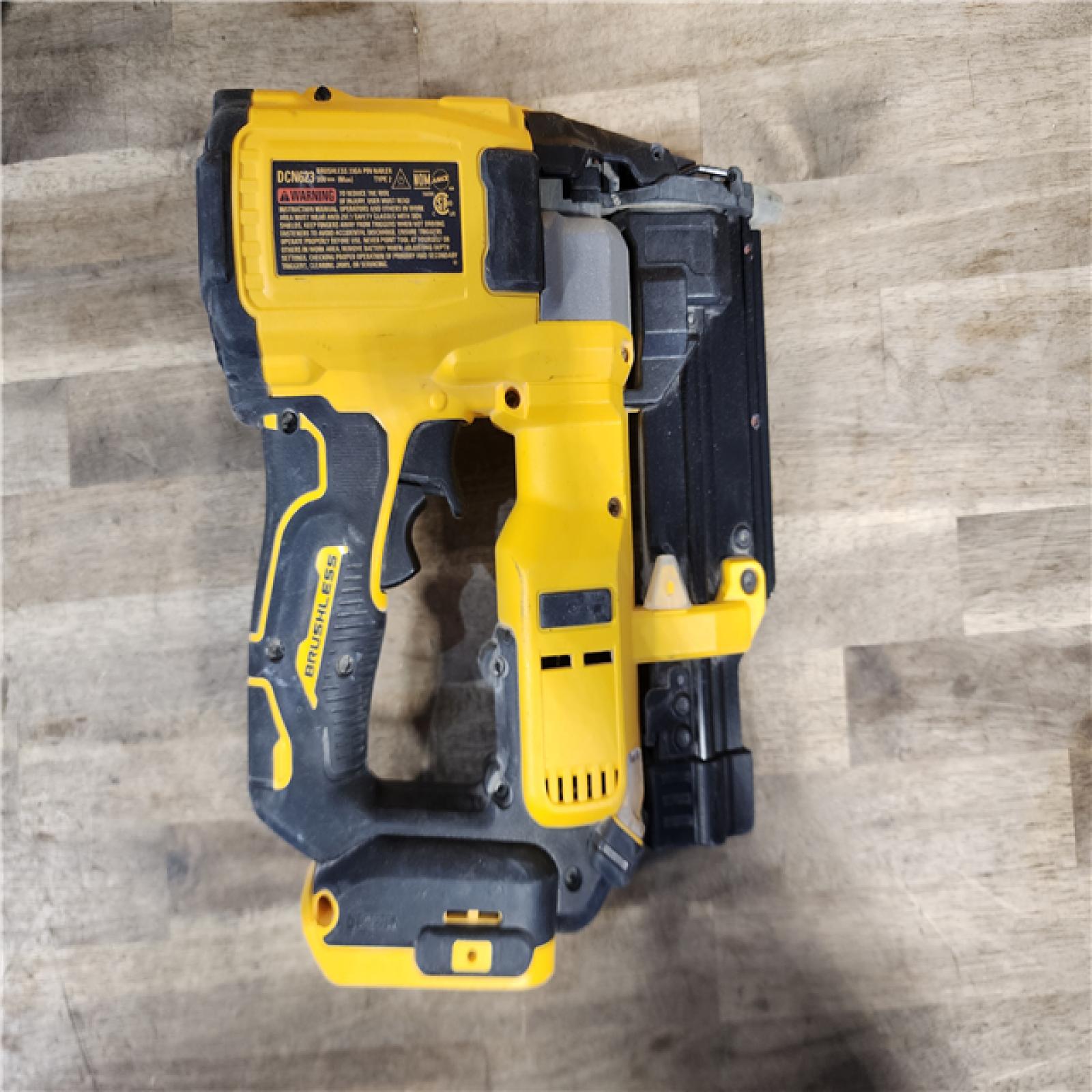 HOUSTON LOCATION - AS-IS DEWALT ATOMIC 20V MAX Lithium Ion Cordless 23 Gauge Pin Nailer Kit with 2.0Ah Battery and Charger