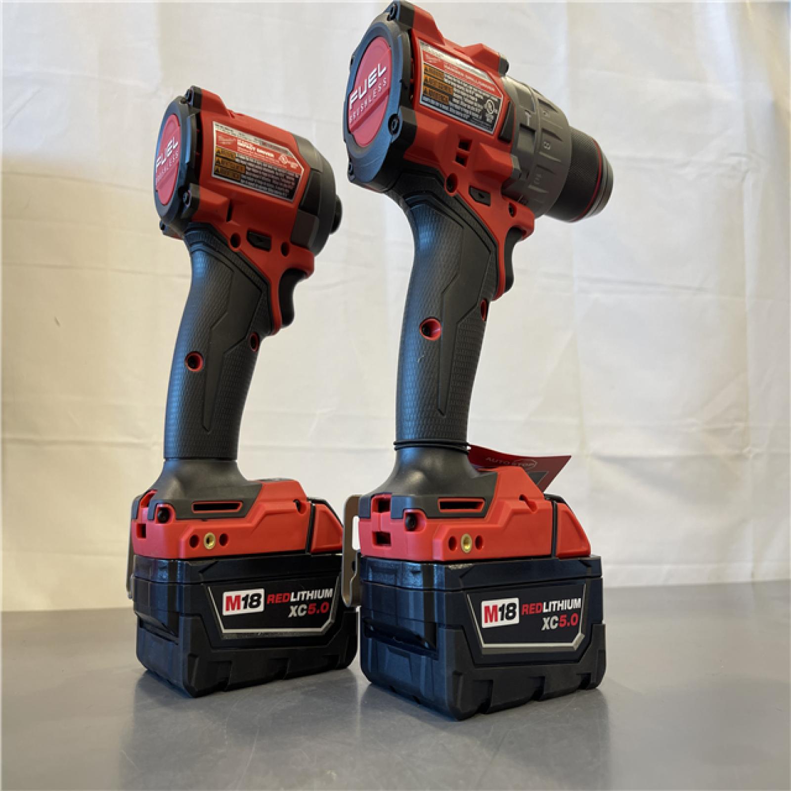 AS-IS - MILWAUKEE FUEL 18V Lithium-Ion Brushless Cordless Hammer Drill and Impact Driver Combo Kit