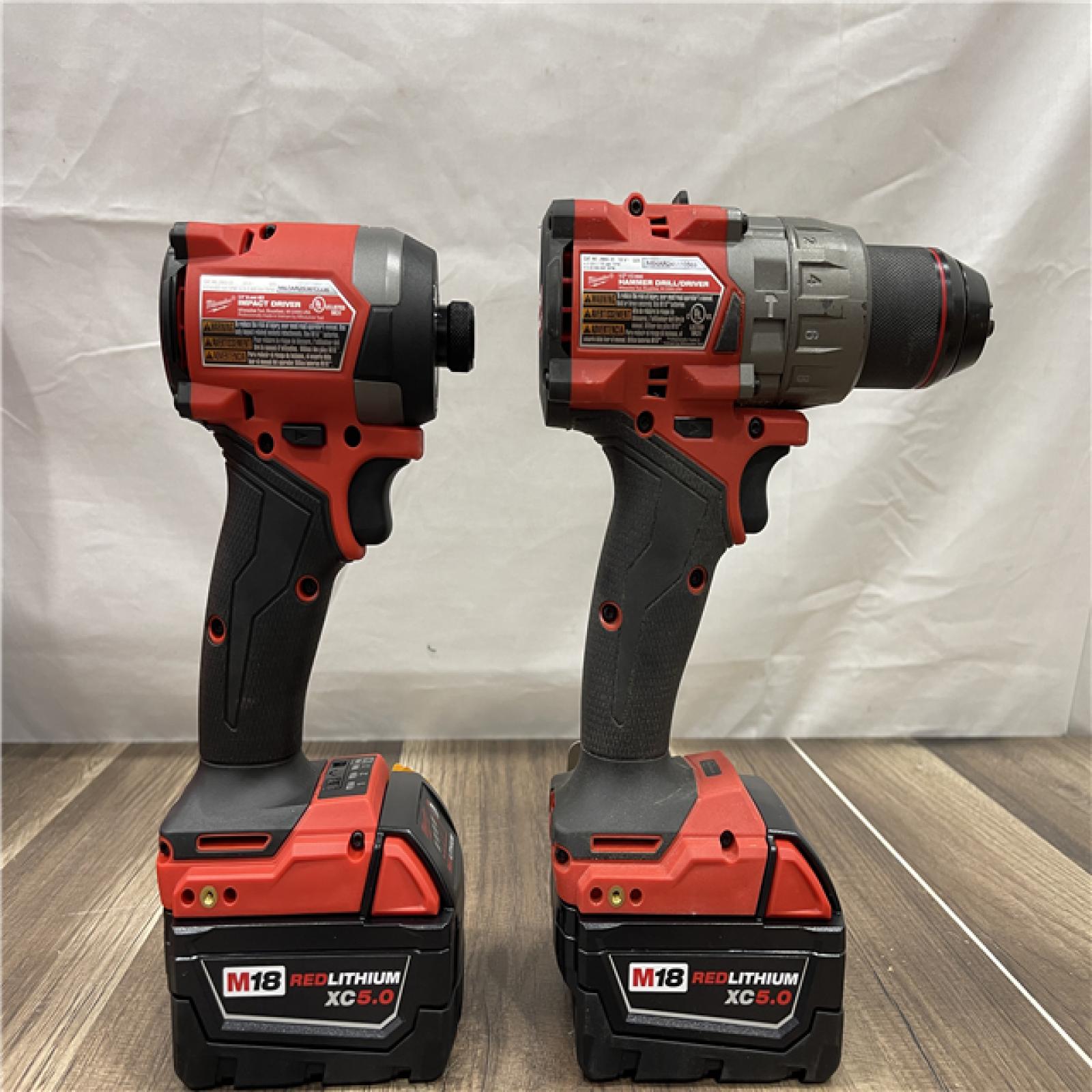 AS-IS Milwaukee M18 FUEL 18V Lithium-Ion Brushless Cordless Hammer Drill and Impact Driver Combo Kit