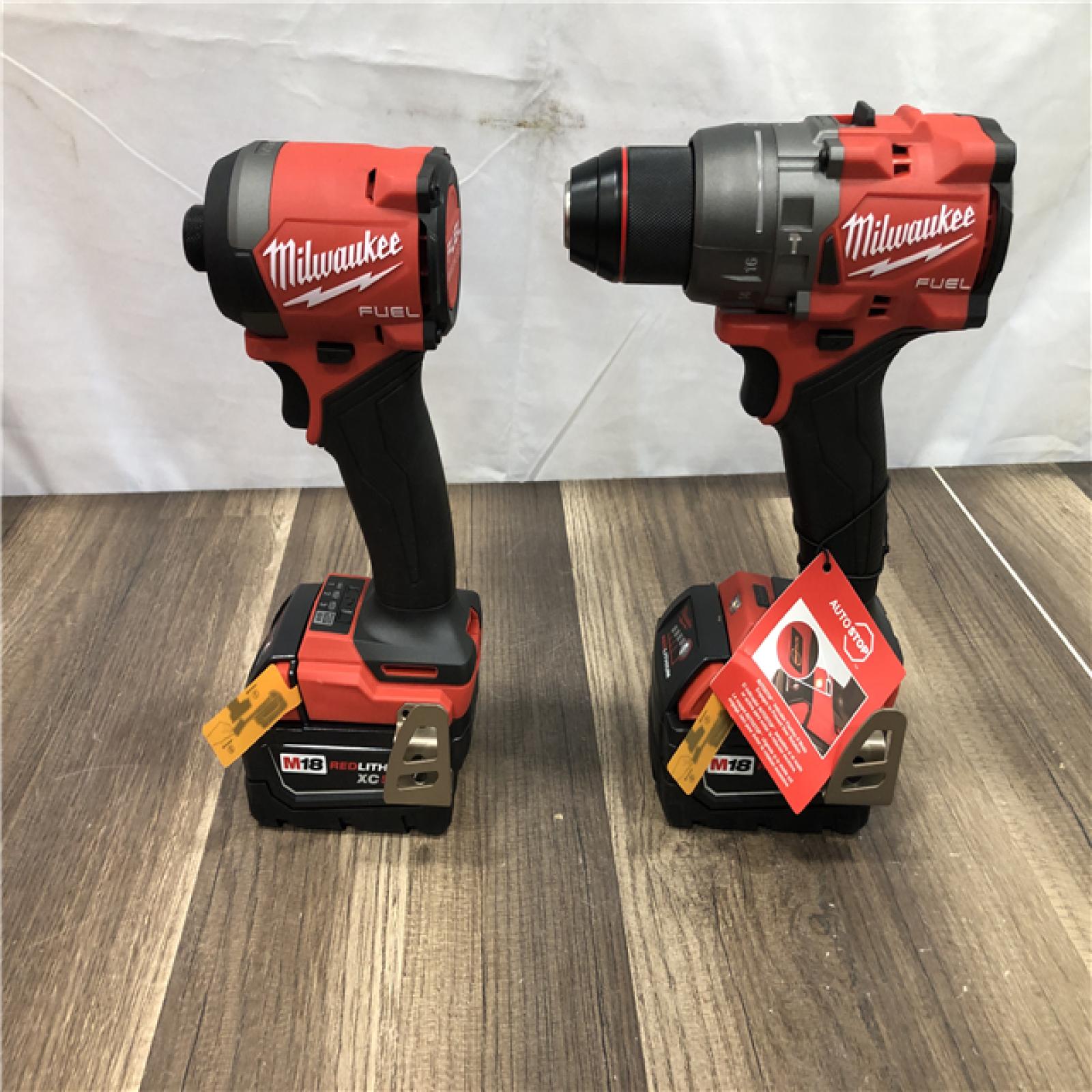 AS-IS Milwaukee FUEL 18V Lithium-Ion Brushless Cordless Hammer Drill and Impact Driver Combo Kit