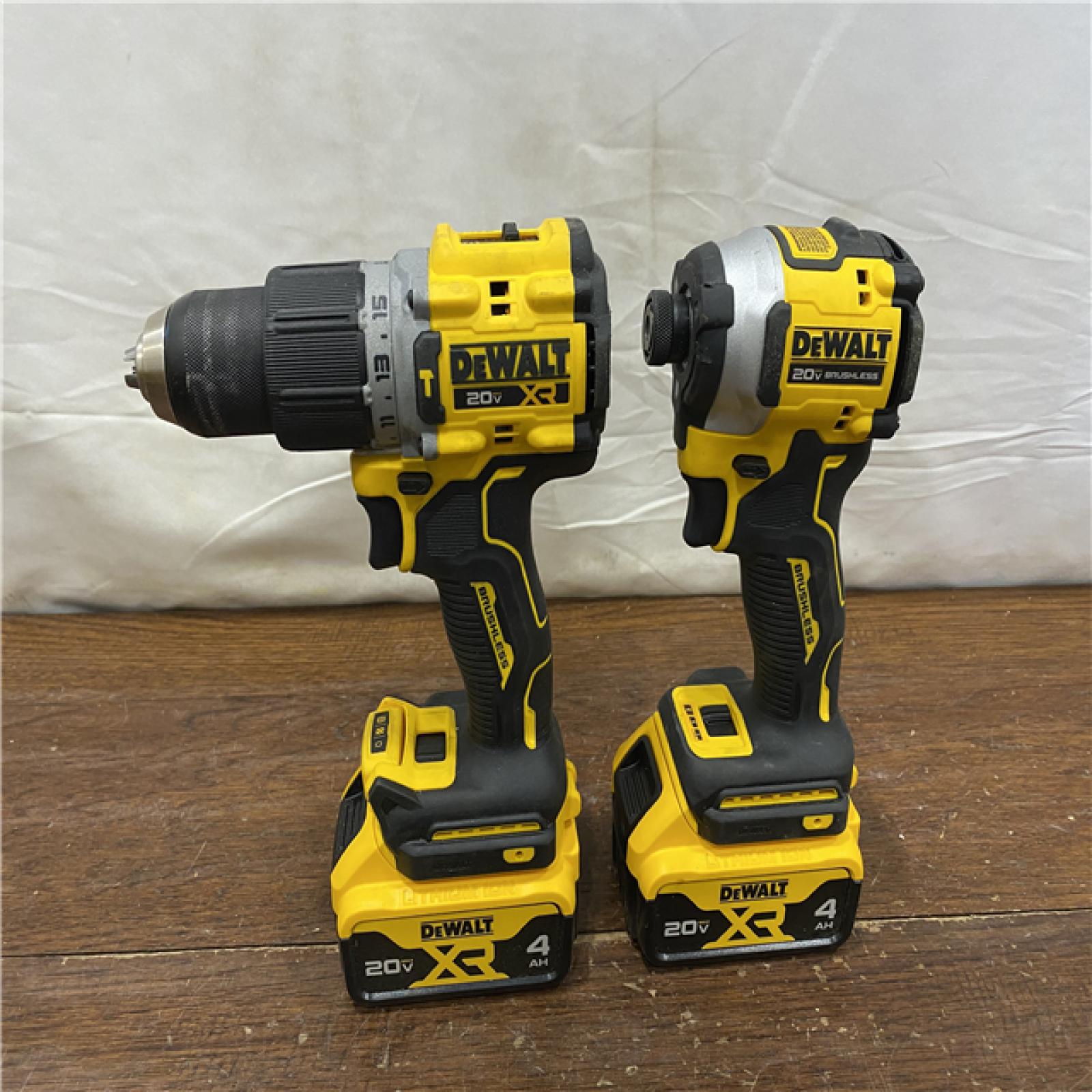 AS-IS DEWALT 20V MAX XR Hammer Drill and ATOMIC Impact Driver 2 Tool Cordless Combo Kit with (2) 4.0Ah Batteries, Charger, and Bag