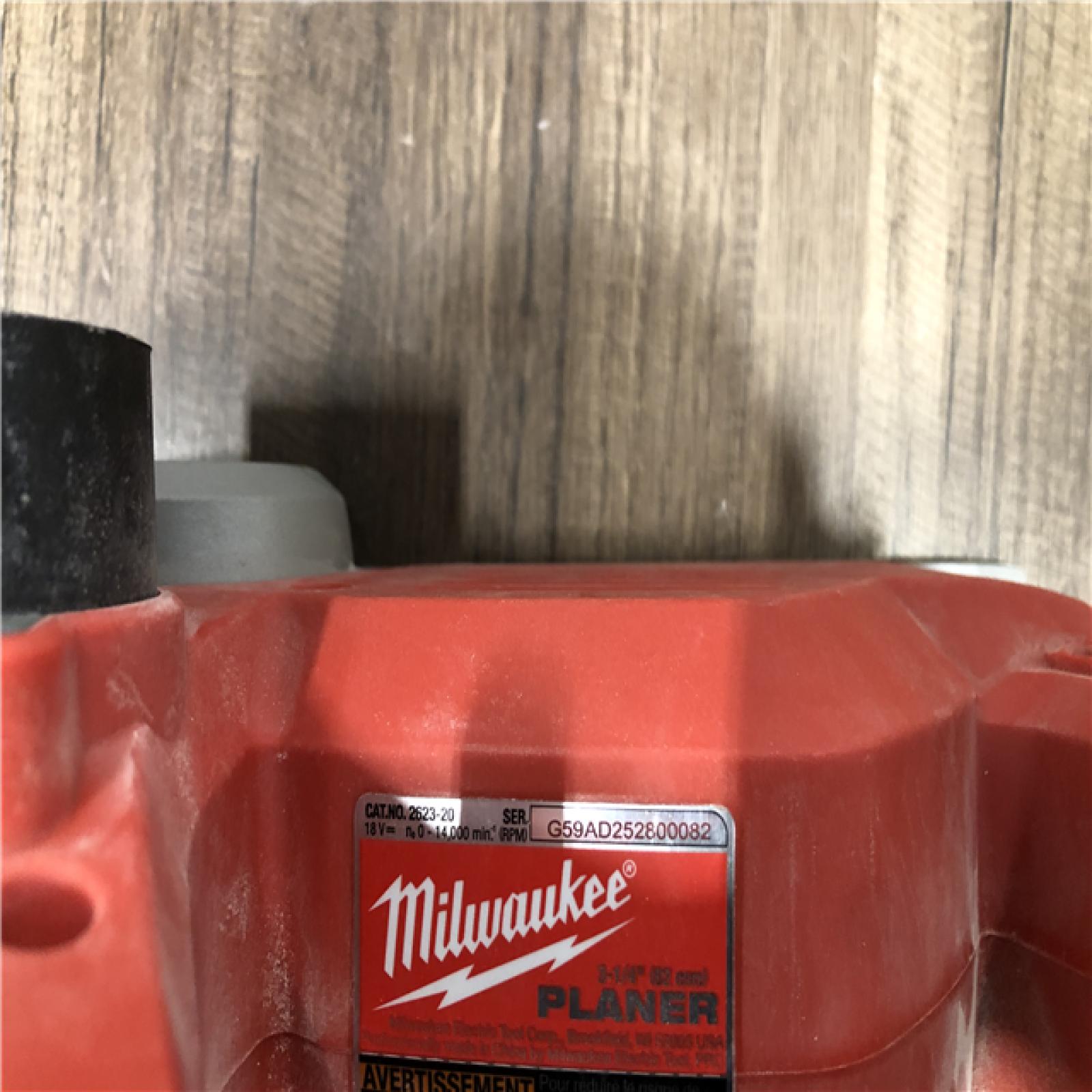 AS-IS Milwaukee M18 18V Lithium-Ion Cordless 3-1/4 in. Planer (Tool-Only)