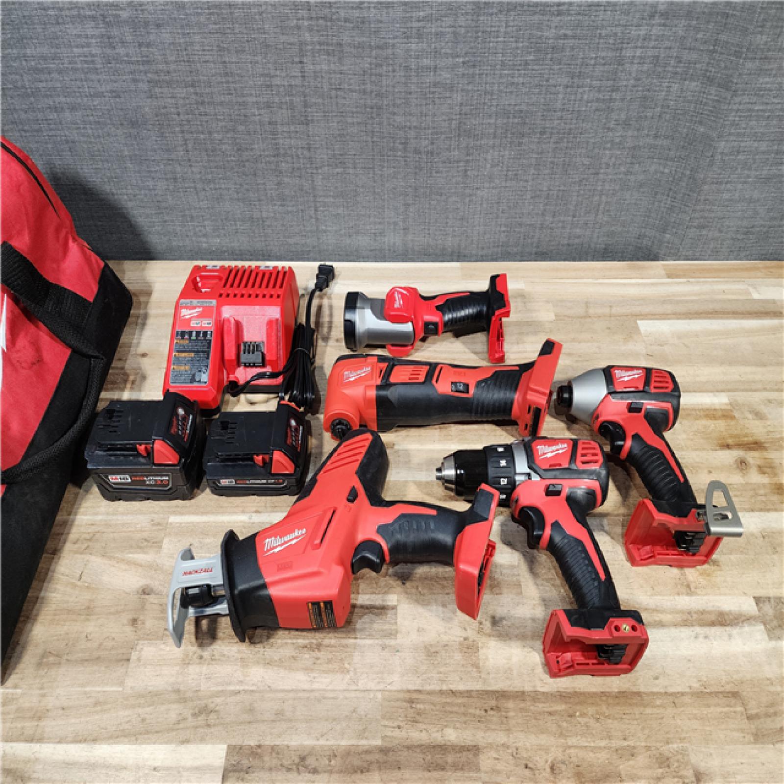 HOUSTON LOCATION - AS-IS MILWAUKEE 5 TOOL COMBO KIT W/ (2) BATTERY & CHARGER