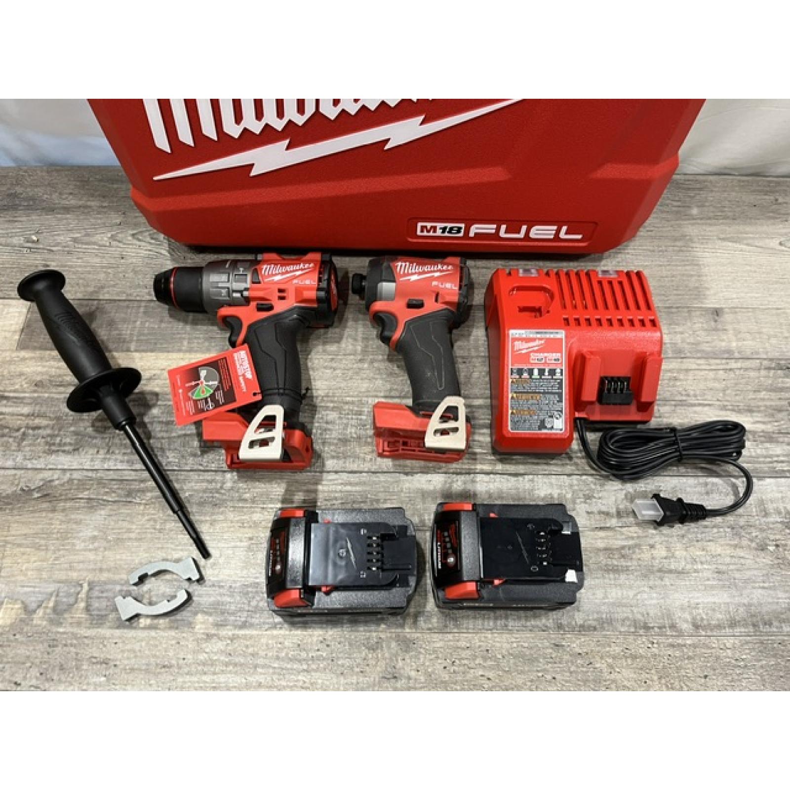 AS-IS Milwaukee FUEL 18V Lithium-Ion Brushless Cordless Hammer Drill and Impact Driver Combo Kit
