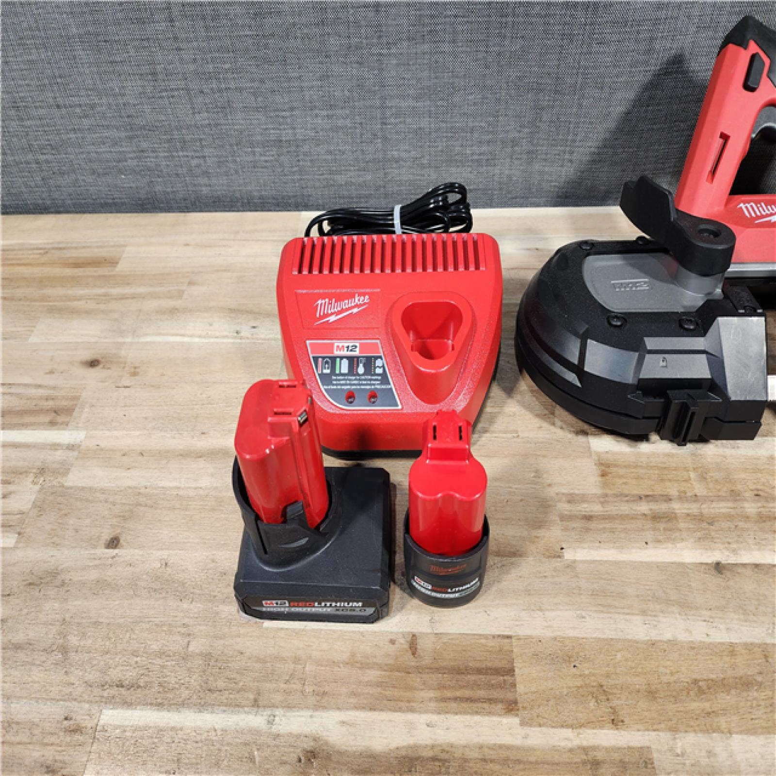 HOUSTON LOCATION - AS-IS MILWAUKEE 3 TOOL COMBO KIT W/ (2) BATTERY & CHARGER