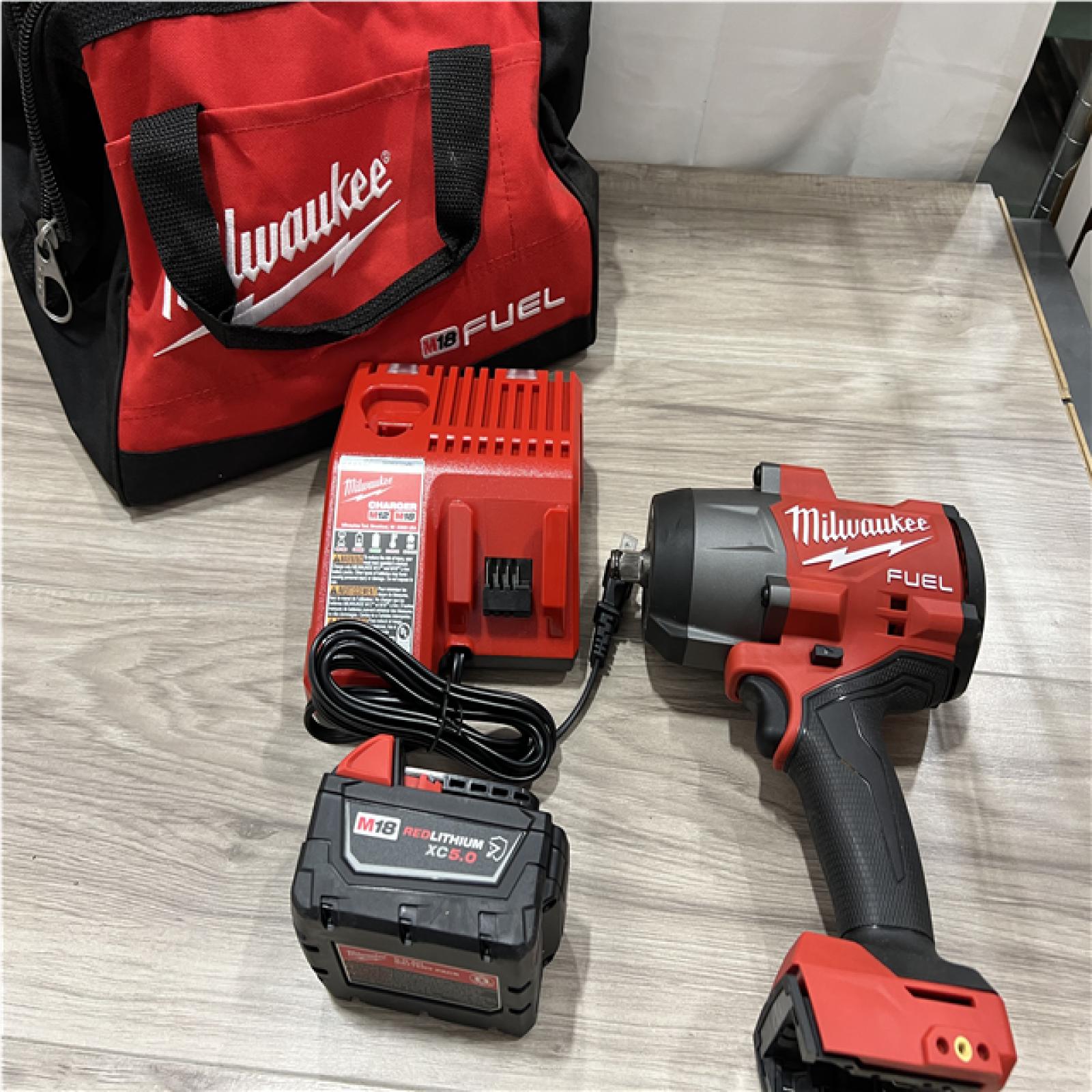 AS-IS Milwaukee FUEL 18V Lithium-Ion Brushless Cordless 1/2 in. Impact Wrench w/Friction Ring Kit
