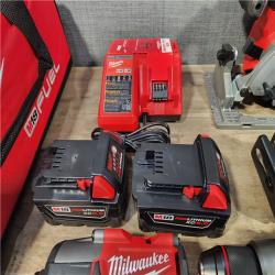 HOUSTON LOCATION - AS-IS (APPEARS LIKE NEW) Milwaukee M18 FUEL 18V Lithium-Ion Brushless Cordless Combo Kit with Two 5.0 Ah Batteries  1 Charger  2 Tool Bags (7-Tool)