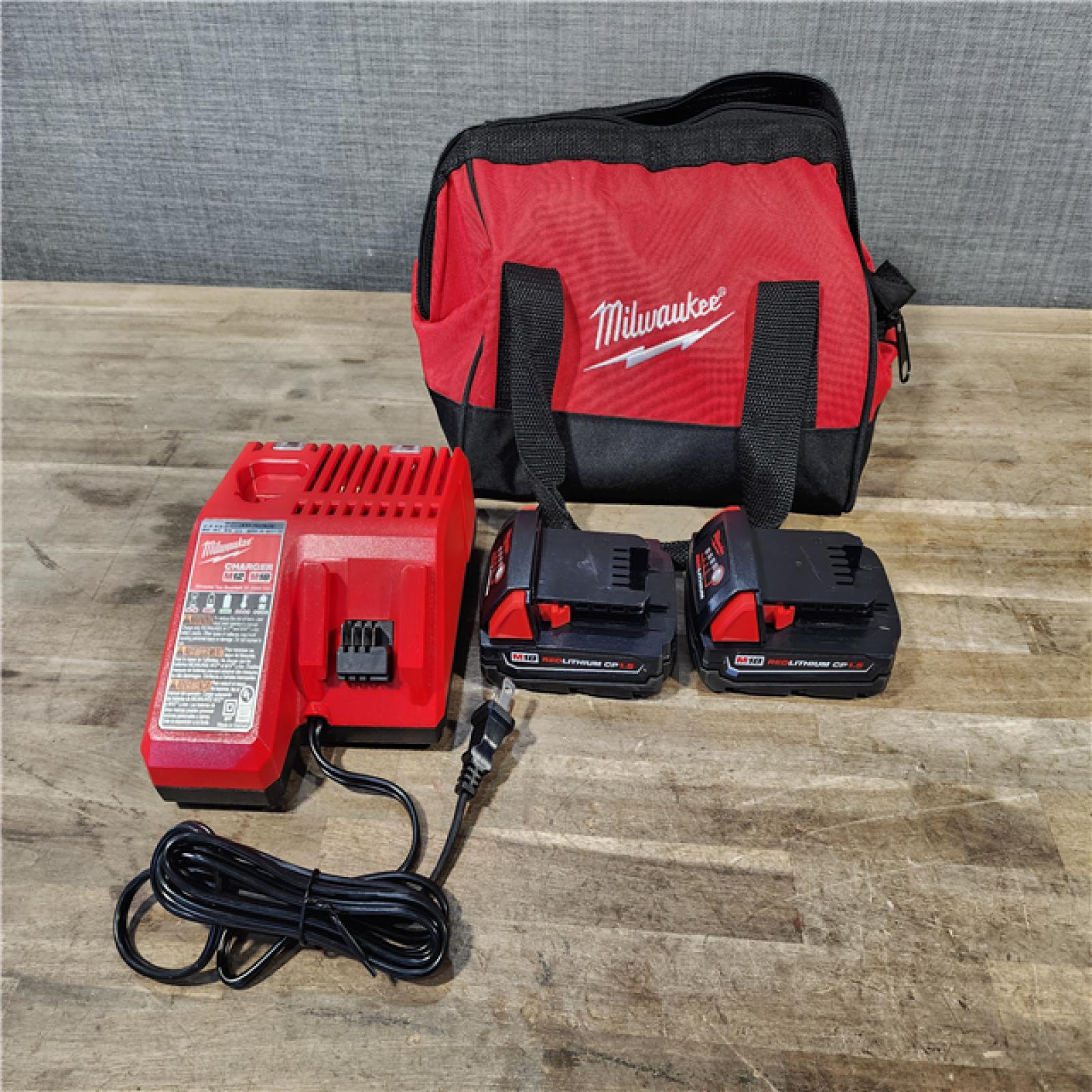 HOUSTON LOCATION - AS-IS Milwaukee 18V Cordless Brushed 2-Tool Drill/Driver and Impact Driver Kit