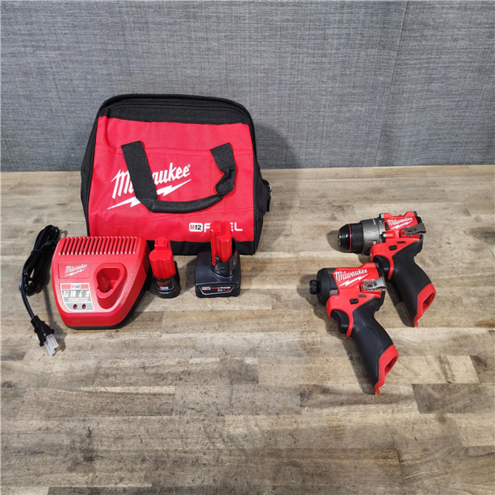 HOUSTON LOCATION - AS-IS (APPEARS LIKE NEW) Milwaukee 3497-22 12V Brushless Hammer Drill and Impact Driver Combo Kit