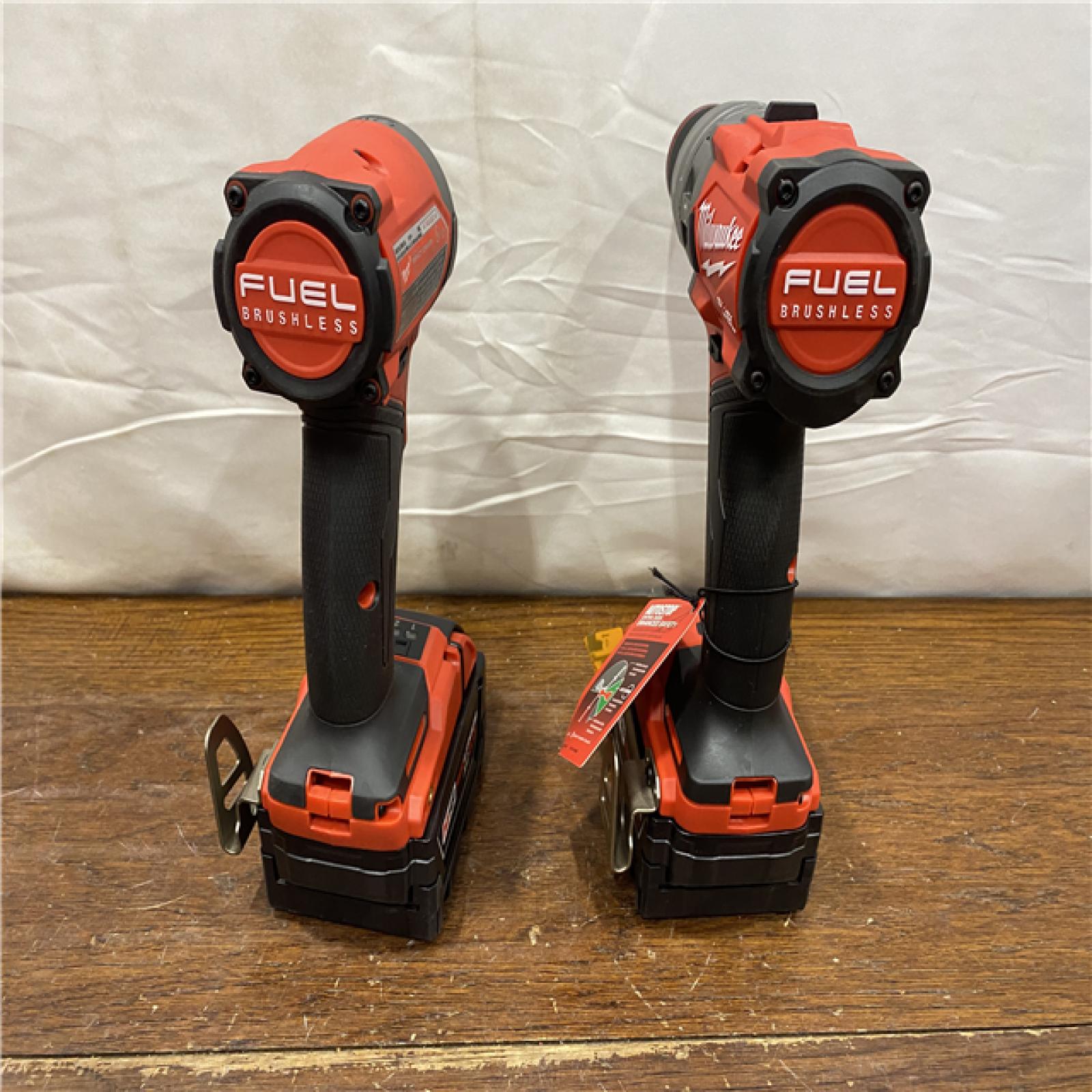 AS-IS MILWAUKEE M18 FUEL 18V Lithium-Ion Brushless Cordless Hammer Drill and Impact Driver Combo Kit (2-Tool) with 2 Batteries
