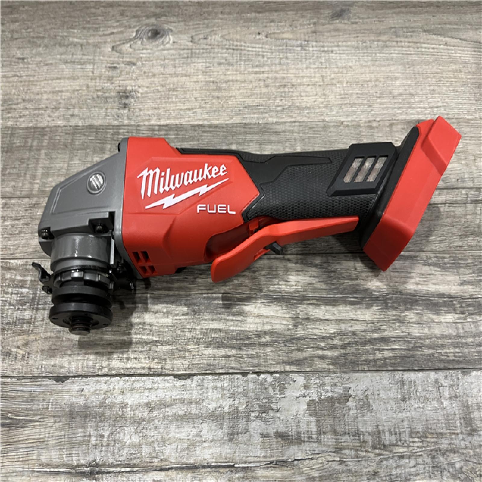 AS-IS Milwaukee FUEL 18V Lithium-Ion Brushless Cordless 4-1/2 in./5 in. Grinder w/Paddle Switch (Tool-Only)