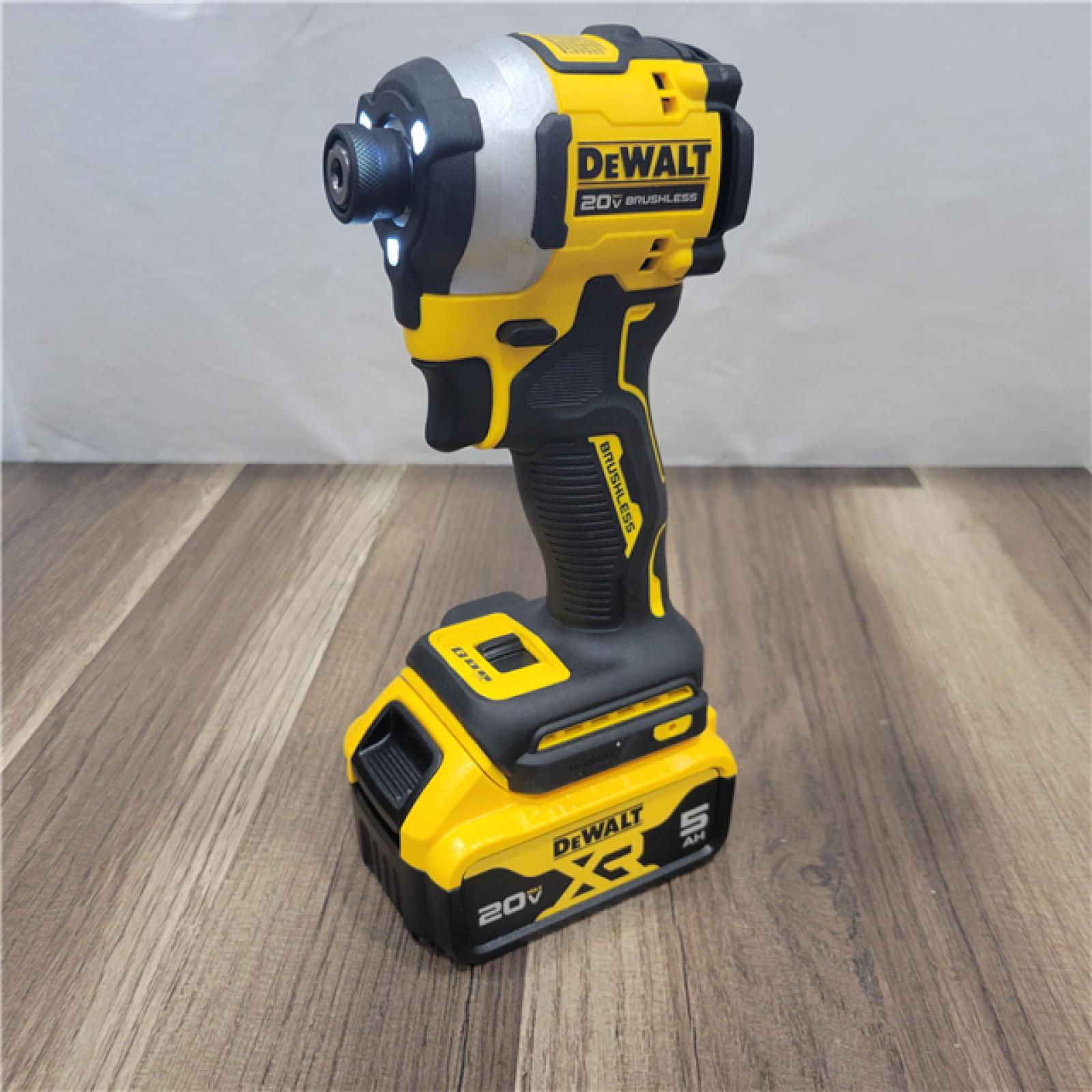 AS-IS DEWALT ATOMIC 20V MAX Lithium-Ion Cordless 1/4 in. Brushless Impact Driver Kit, 5 Ah Battery, Charger, and Bag