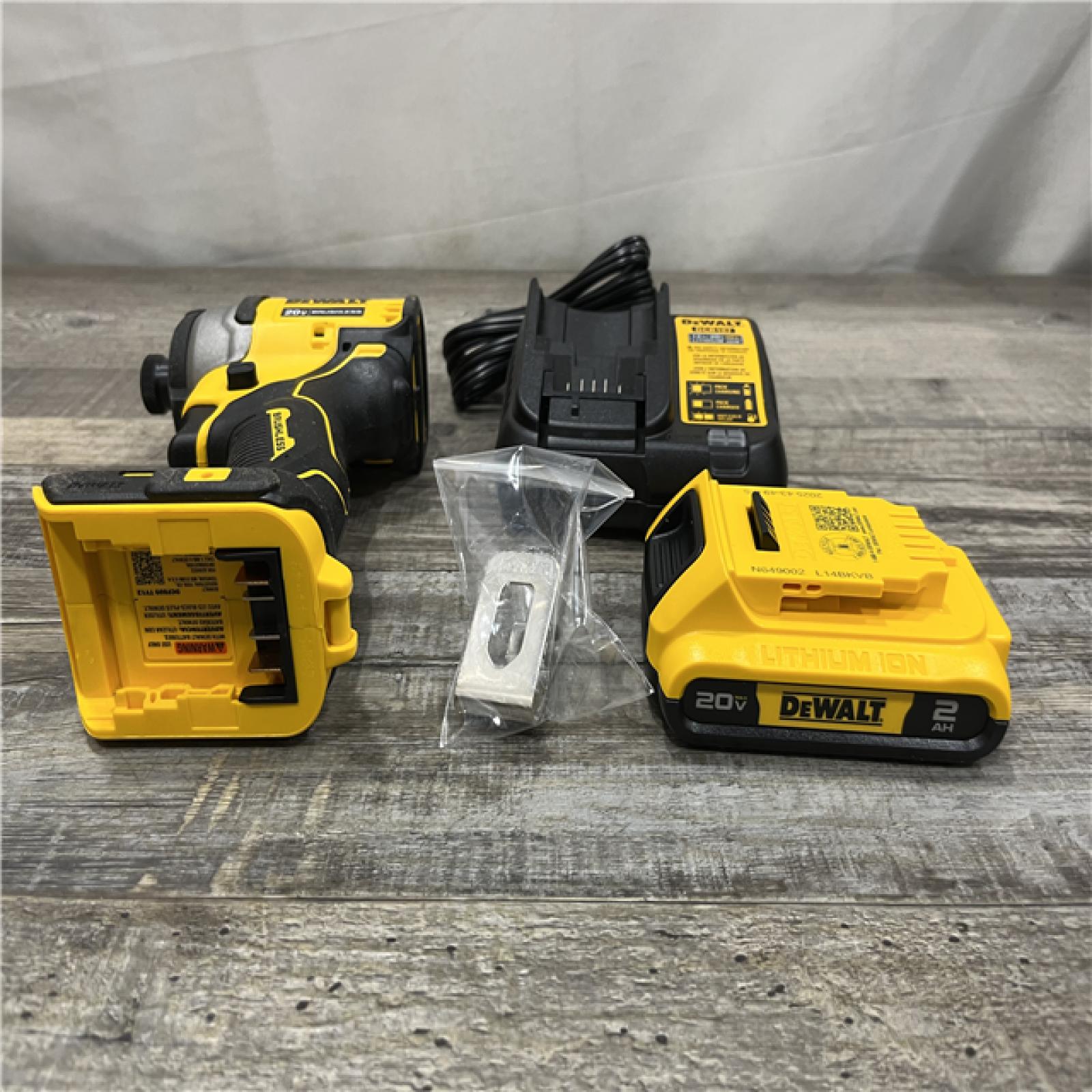 AS-IS DEWALT Atomic 20V Max Lithium-Ion Brushless Cordless Compact 1/4 in. Impact Driver Kit