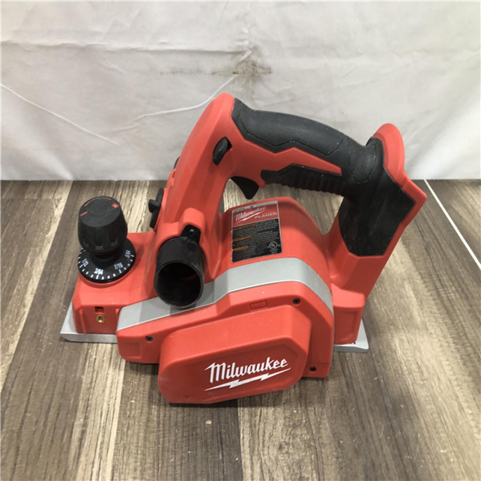AS-IS Milwaukee M18 18V Lithium-Ion Cordless 3-1/4 in. Planer (Tool-Only)