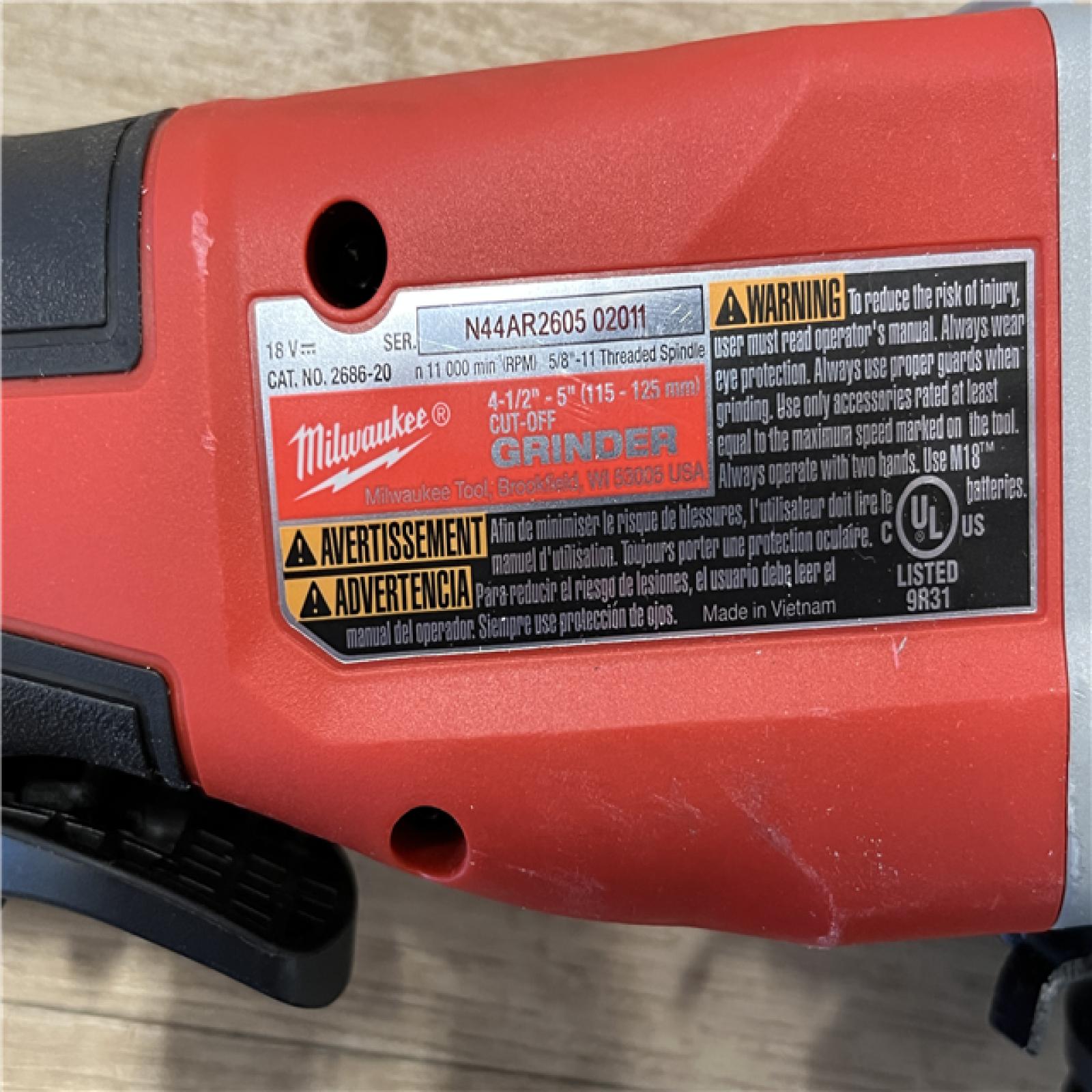 AS-IS Milwaukee 18V Lithium-Ion Brushless Cordless 4-1/2 in./5 in. Grinder w/Paddle Switch (Tool-Only)