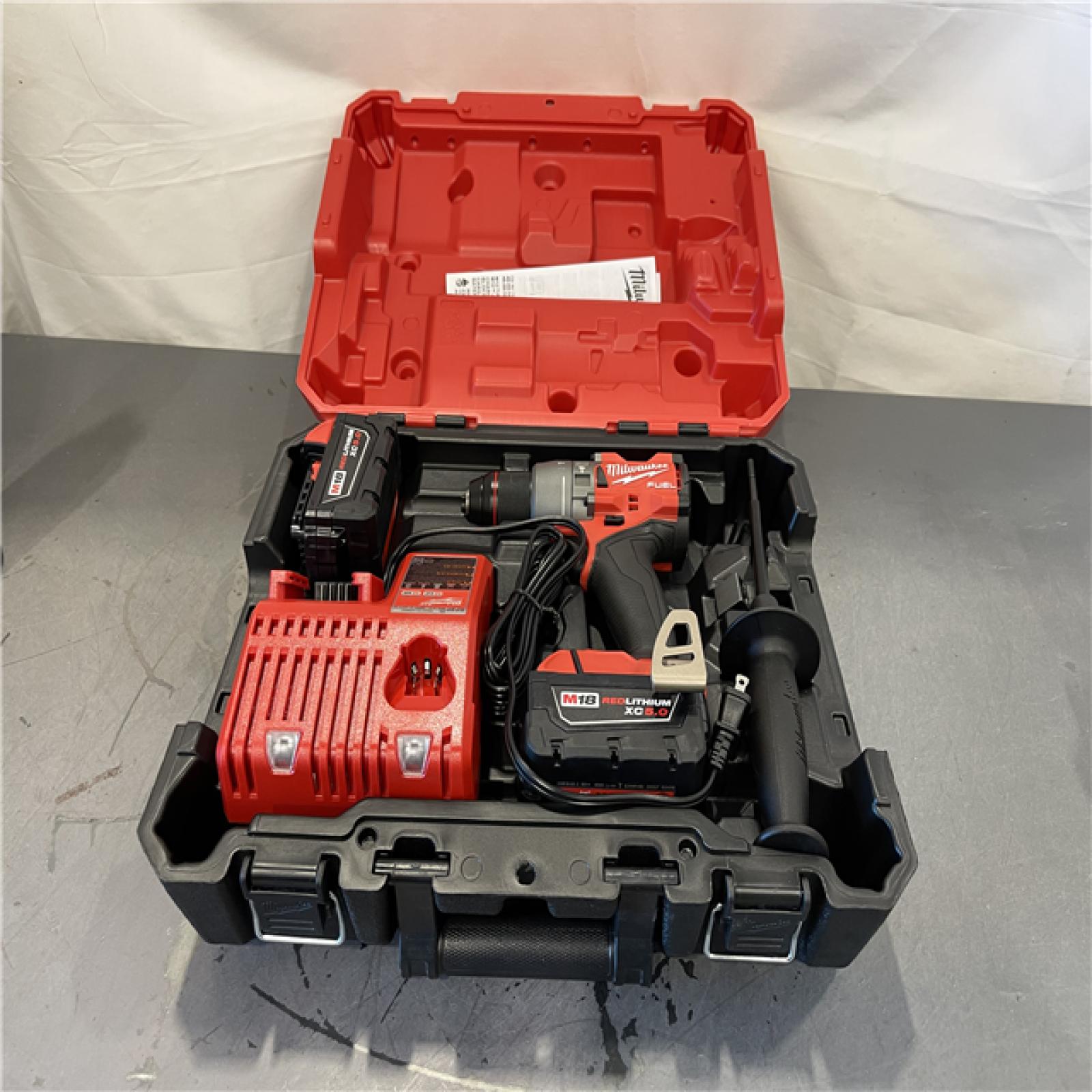 AS-IS - Milwaukee M18 FUEL 18V Lithium-Ion Brushless Cordless 1/2 in. Hammer Drill Driver Kit