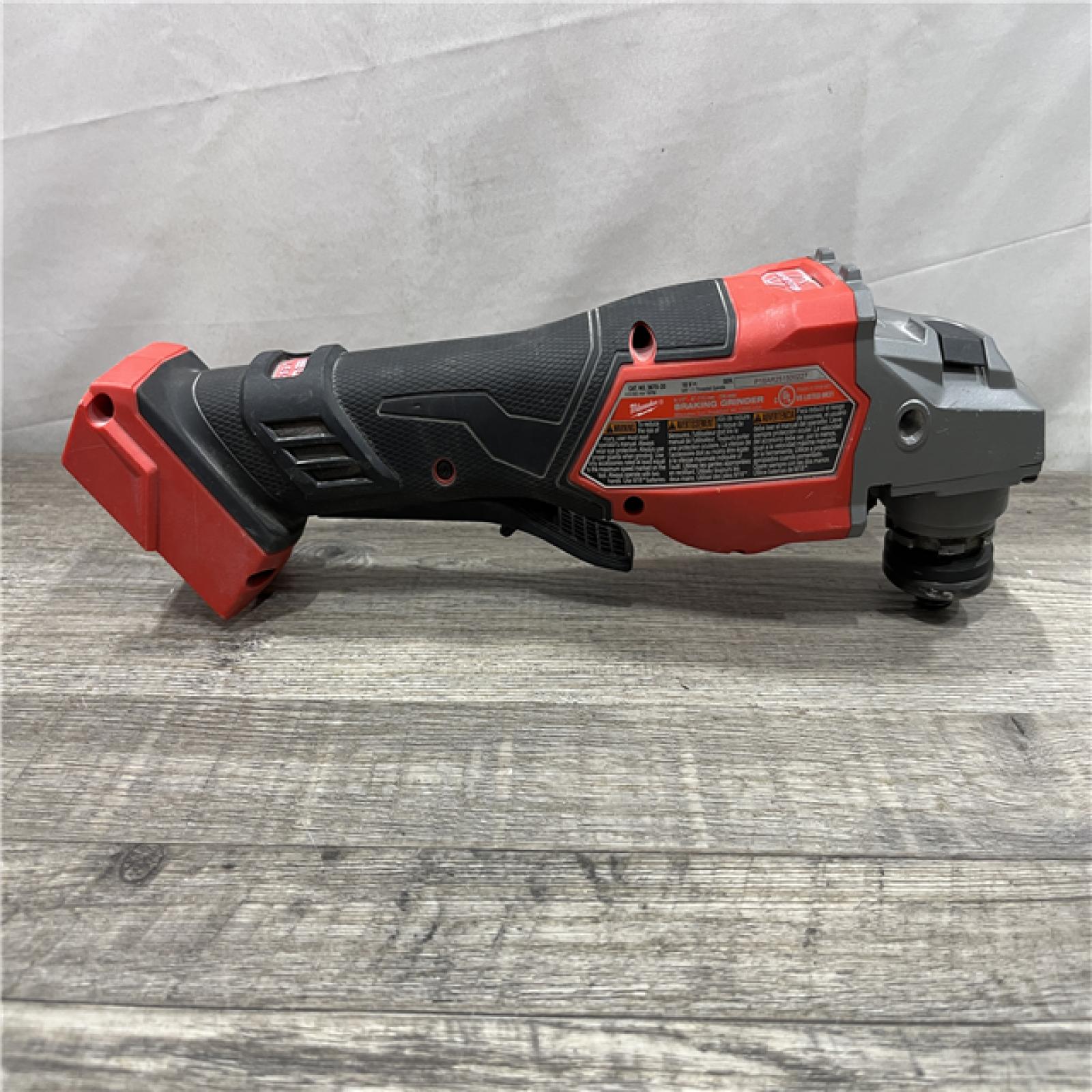 AS-IS Milwaukee FUEL 18-Volt Lithium-Ion Brushless Cordless 4-1/2 in./6 in. Braking Grinder with Paddle Switch (Tool-Only)