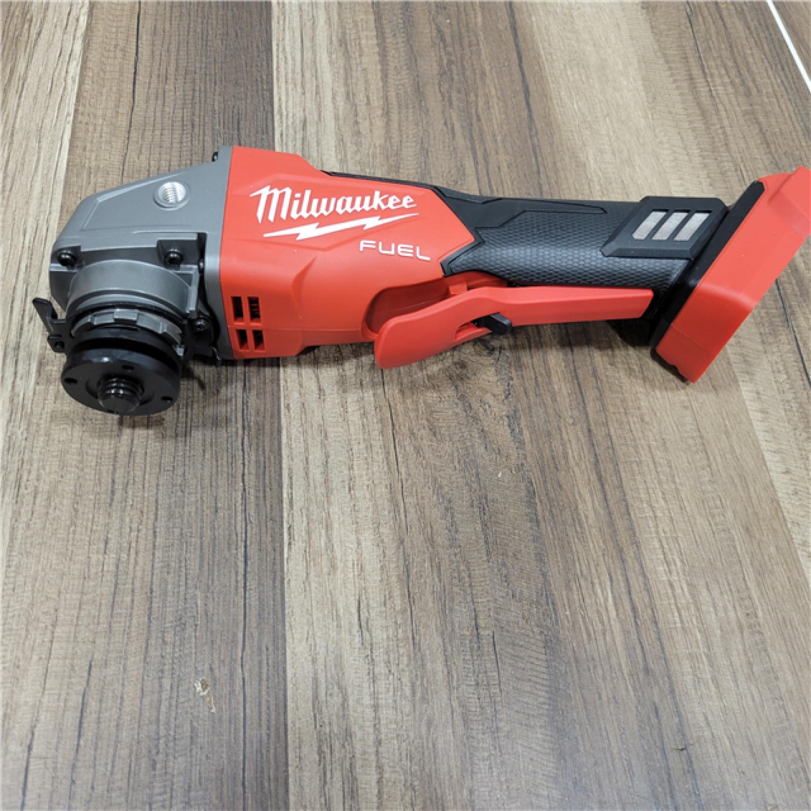 AS-IS Milwaukee 2880-20 M18 FUEL 18-Volt Lithium-Ion Brushless Cordless 4-1/2 in./5 in. Grinder W/Paddle Switch (Tool-Only)