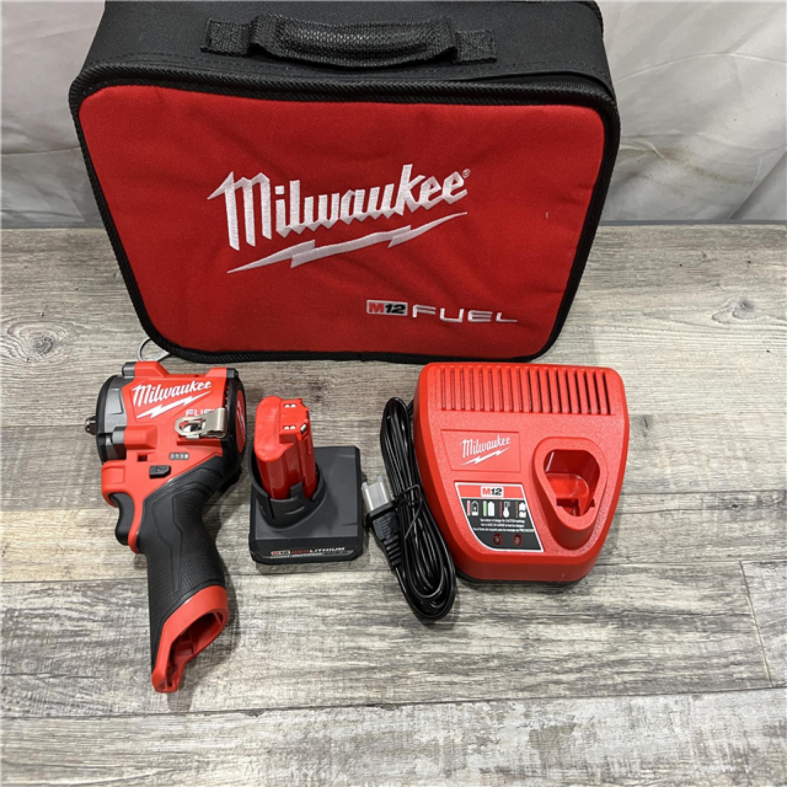 AS-IS Milwaukee FUEL 12V Li-Ion Brushless Cordless Stubby 3/8 in. Impact Wrench Kit