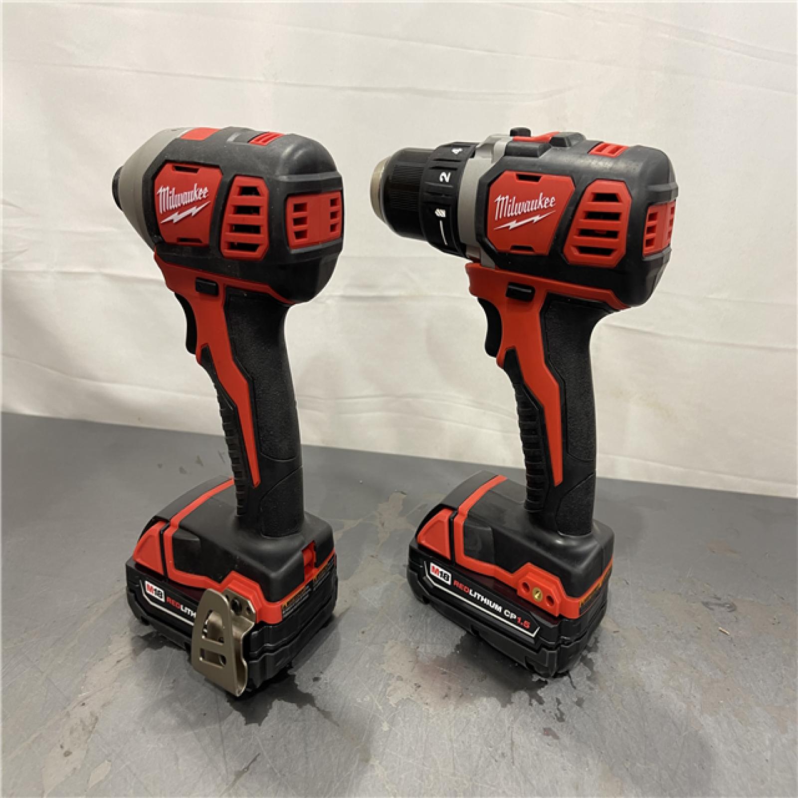AS-IS - Milwaukee M18 18V Lithium-Ion Cordless Drill Driver/Impact Driver Combo Kit