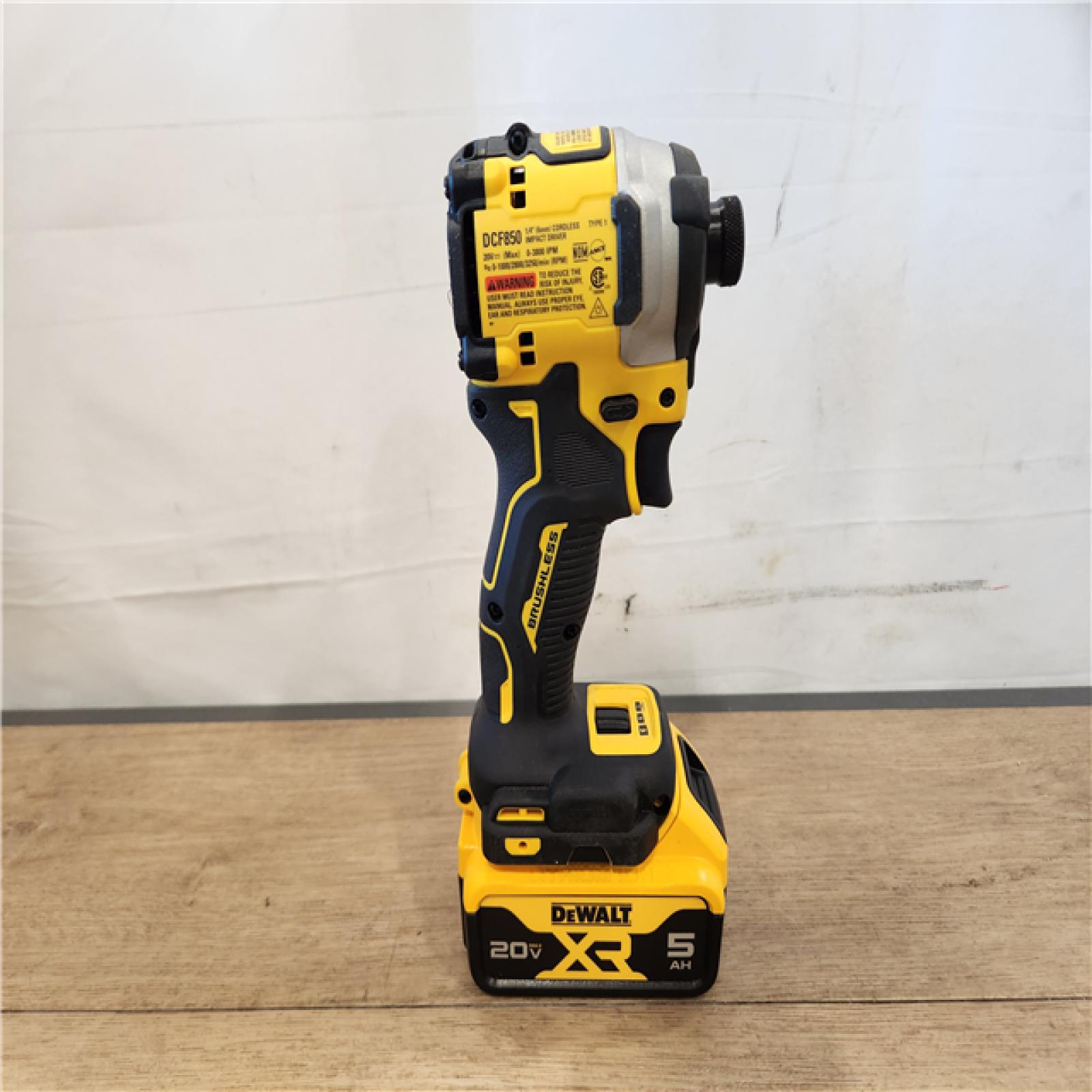 AS-IS- DEWALT ATOMIC 20V MAX Lithium-Ion Cordless 1/4 in. Brushless Impact Driver Kit  5 Ah Battery  Charger  and Bag