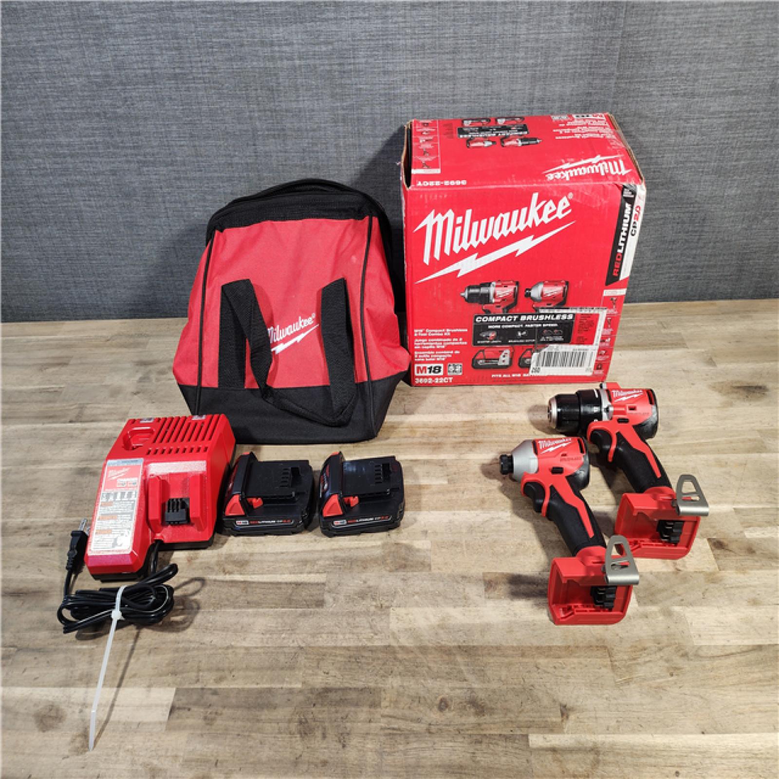 HOUSTON LOCATION - AS-IS Milwaukee M18 18V Lithium-Ion Brushless Cordless Compact Drill/Impact Combo Kit (2-Tool) W/(2) 2.0 Ah Batteries, Charger & Bag