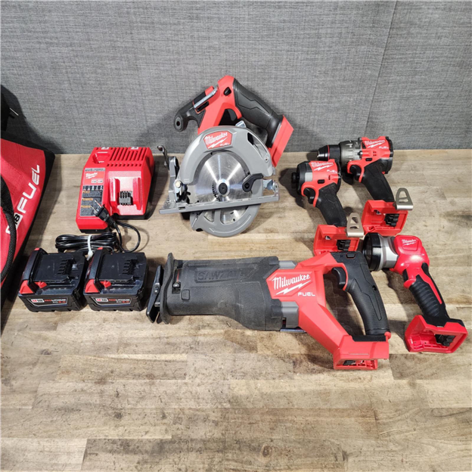 HOUSTON LOCATION - AS-IS Milwaukee 5 Tool Combo Kit W/ (2) Battery & Charger