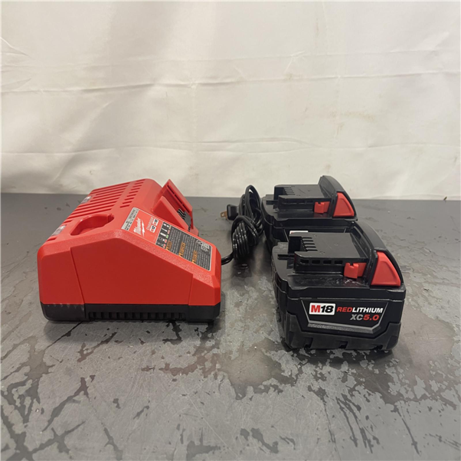 AS-IS-Milwaukee M18 18-Volt Lithium-Ion XC Starter Kit with Two 5.0Ah Batteries and Charger