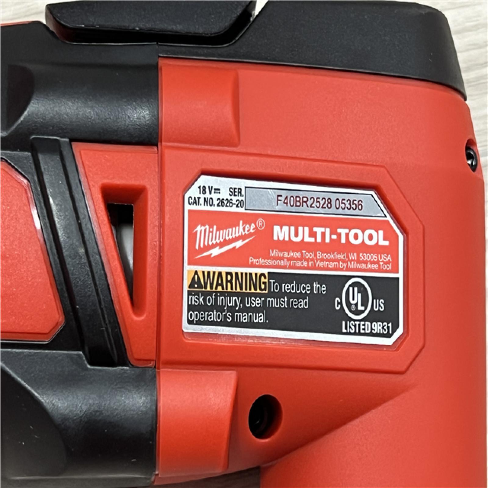 AS-IS Milwaukee 2626-2 M18 18V Cordless Oscillating Multi-Tool Variable Speed  REDLITHIUM Battery Compatible  Fast Cutting  Sanding & Scraping Kit
