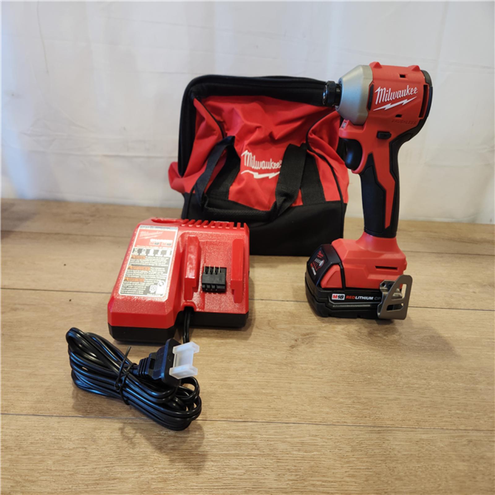 AS-IS- Milwaukee M18 Compact Brushless 1/4  Hex Impact Driver Kit