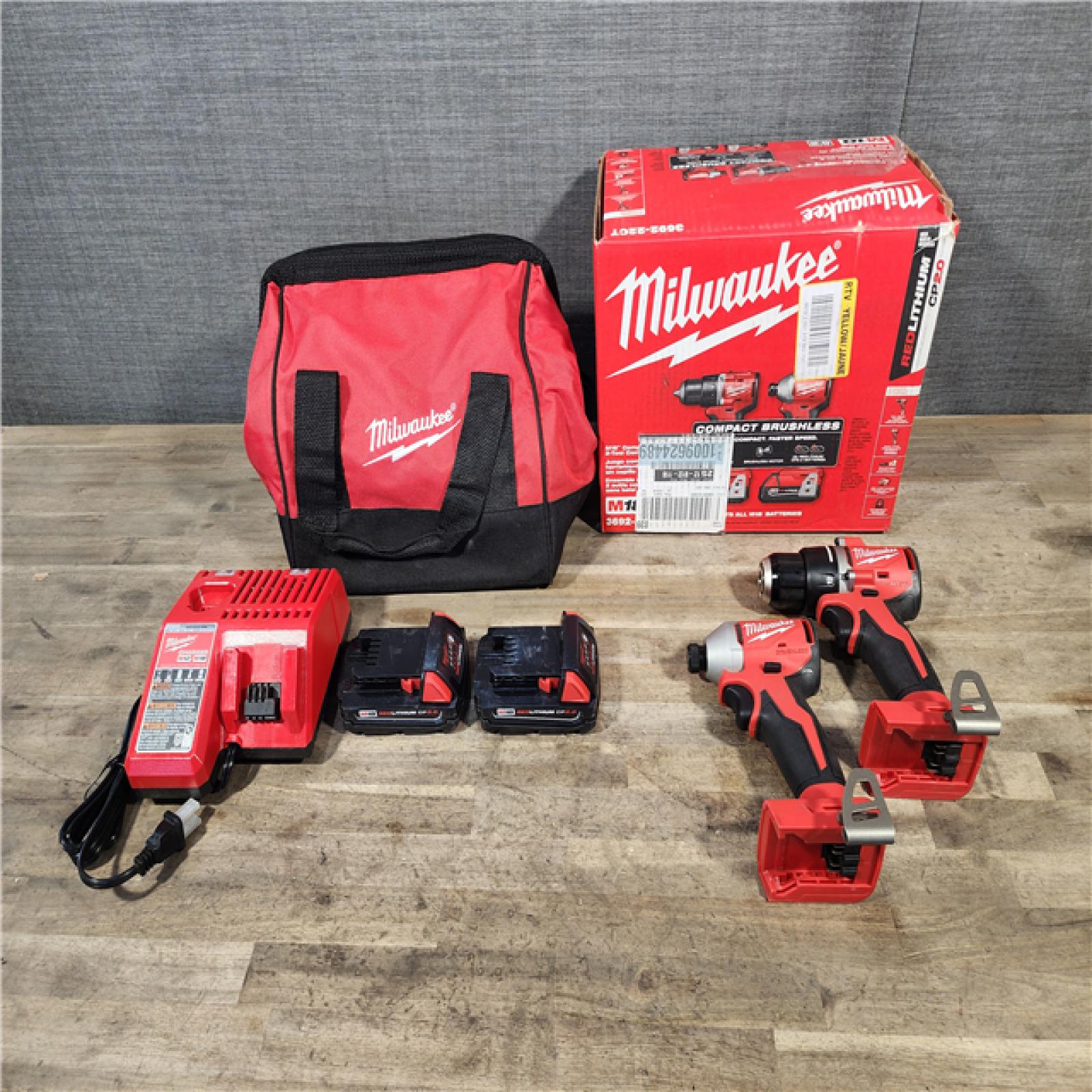 HOUSTON LOCATION - AS-IS Milwaukee M18 18V Lithium-Ion Brushless Cordless Compact Drill/Impact Combo Kit (2-Tool) W/(2) 2.0 Ah Batteries  Charger & Bag