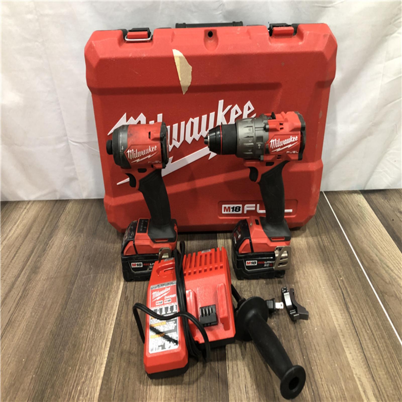 AS-IS Milwaukee FUEL 18V Lithium-Ion Brushless Cordless Hammer Drill and Impact Driver Combo Kit