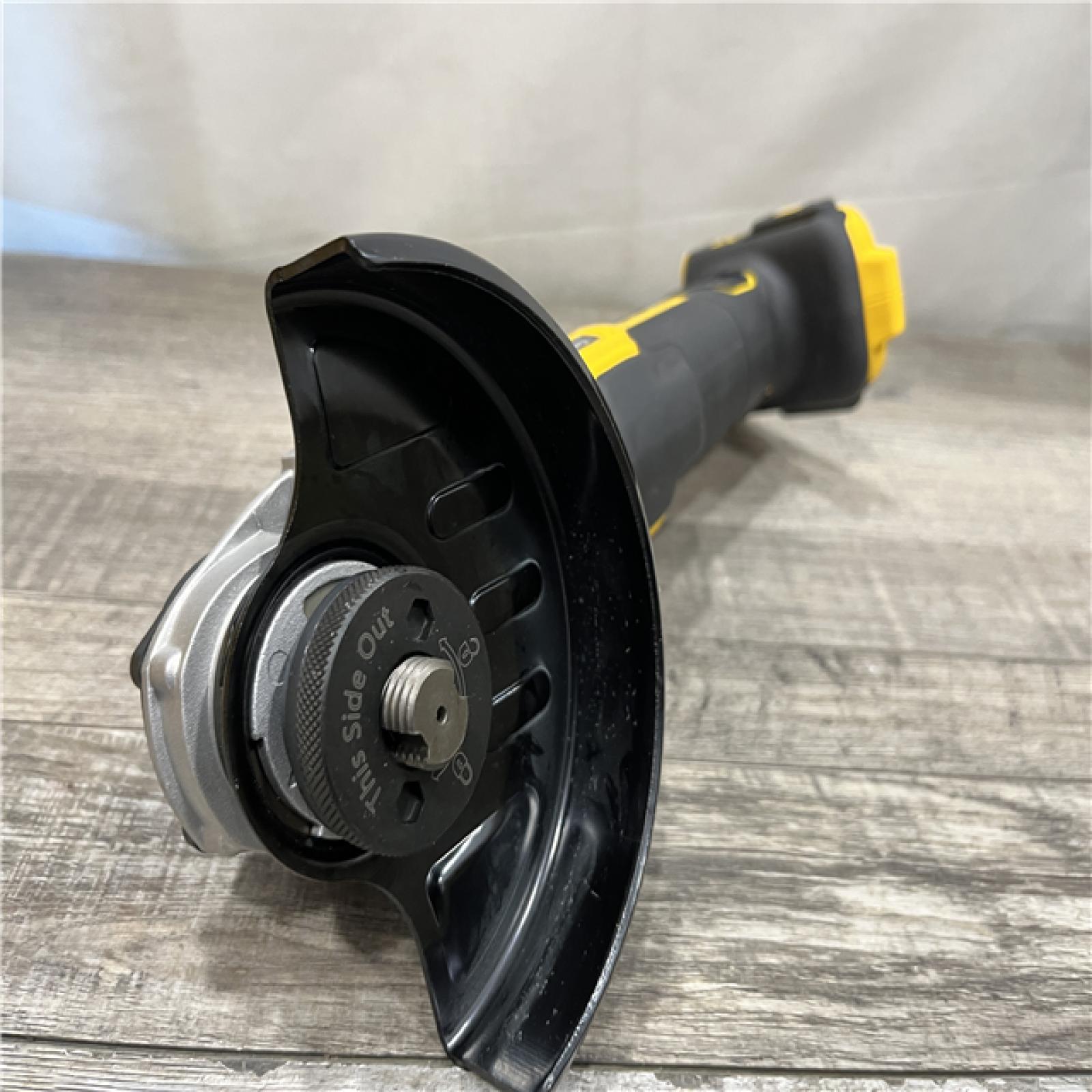 AS-IS DEWALT 20V MAX XR Cordless Brushless 4.5 in. Slide Switch Small Angle Grinder with Kickback Brake (Tool Only)