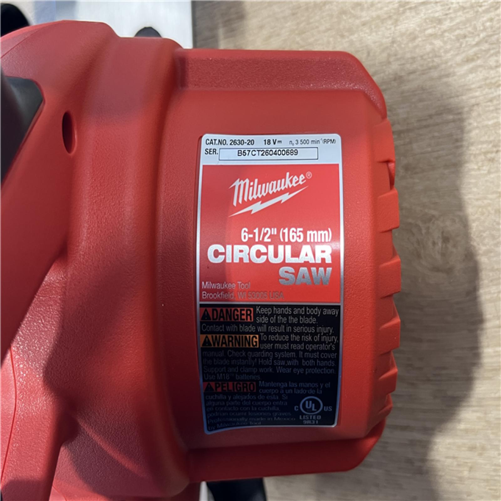 AS-IS Milwaukee 18V Lithium-Ion Cordless 6-1/2 in. Circular Saw (Tool-Only)