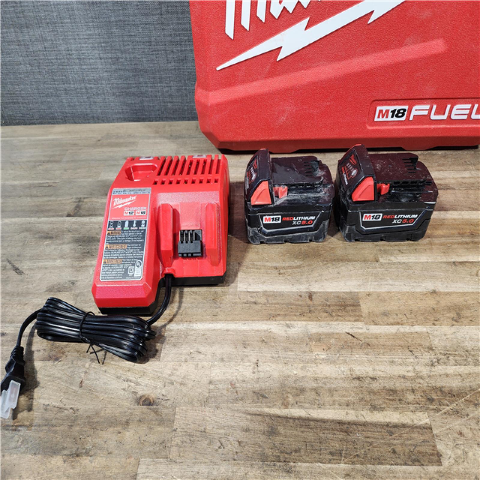 HOUSTON LOCATION - AS-IS Milwaukee FUEL 18V Lithium-Ion Brushless Cordless Hammer Drill and Impact Driver Combo Kit