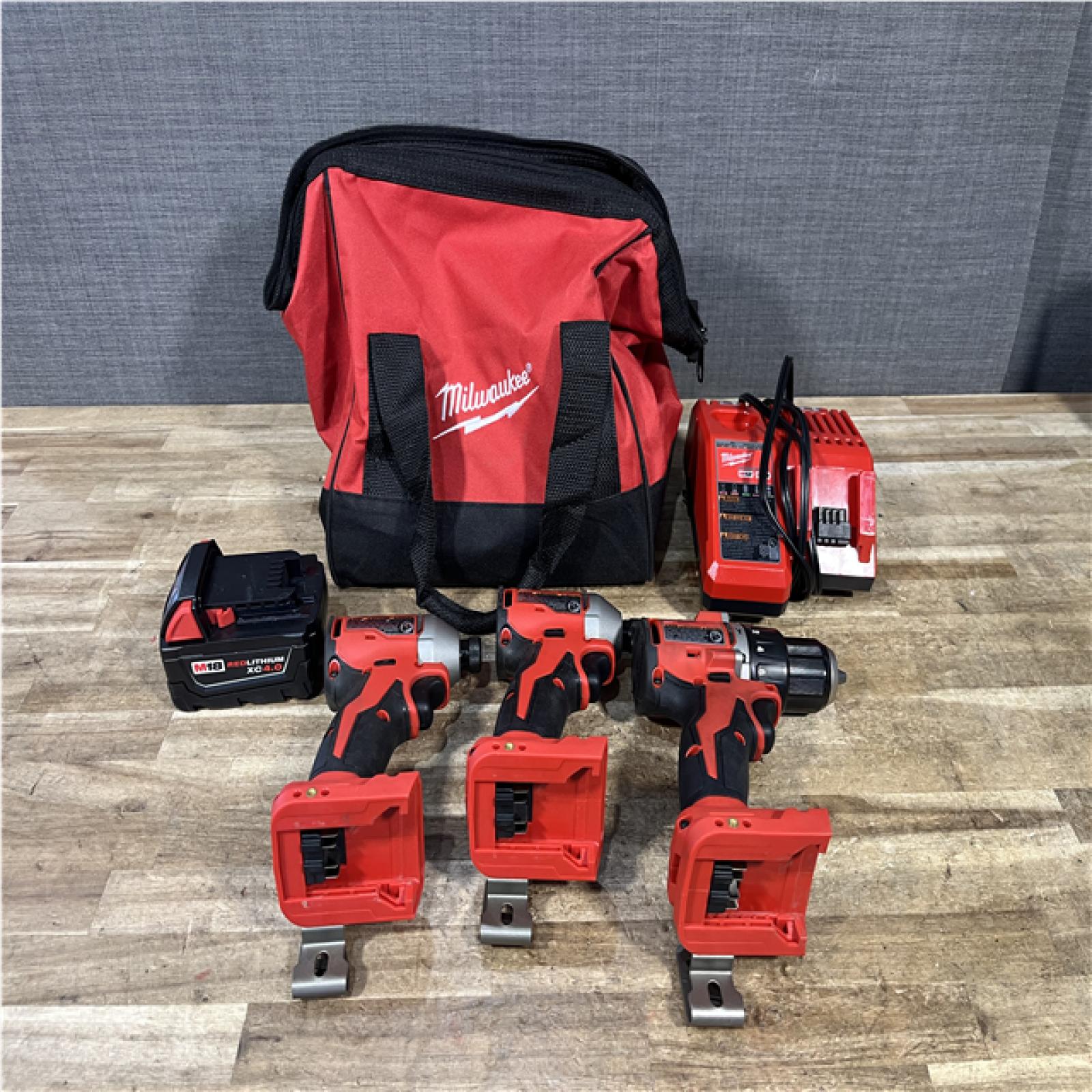 Houston Location AS-IS Milwaukee Hammer Drill Driver and Impact Drivers QTY/2 and Battery with Charger