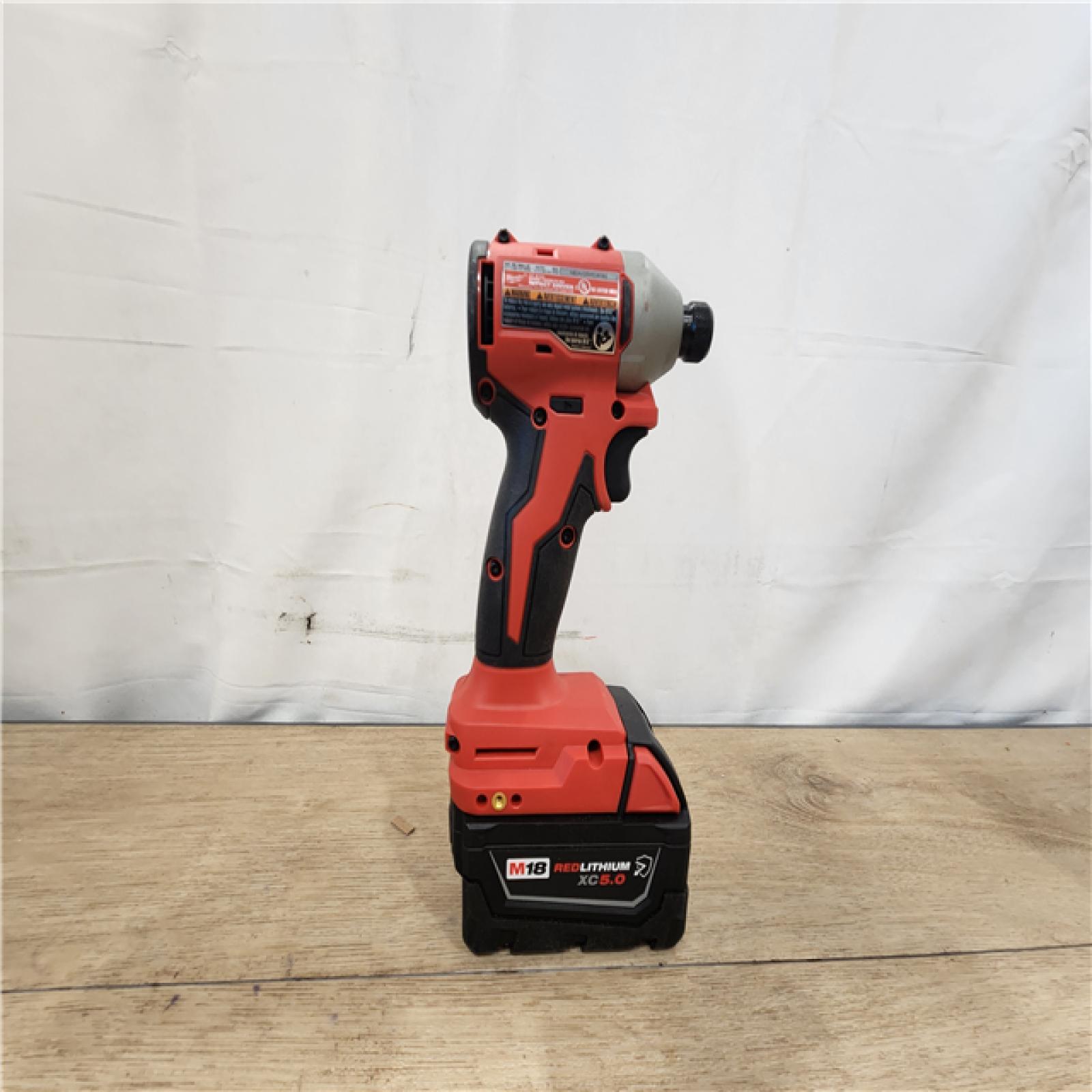 AS-IS- Milwaukee  M18 18-Volt Lithium-Ion Brushless Cordless 1/4 in. Compact Impact Driver with M18 5.0Ah Battery and Charger