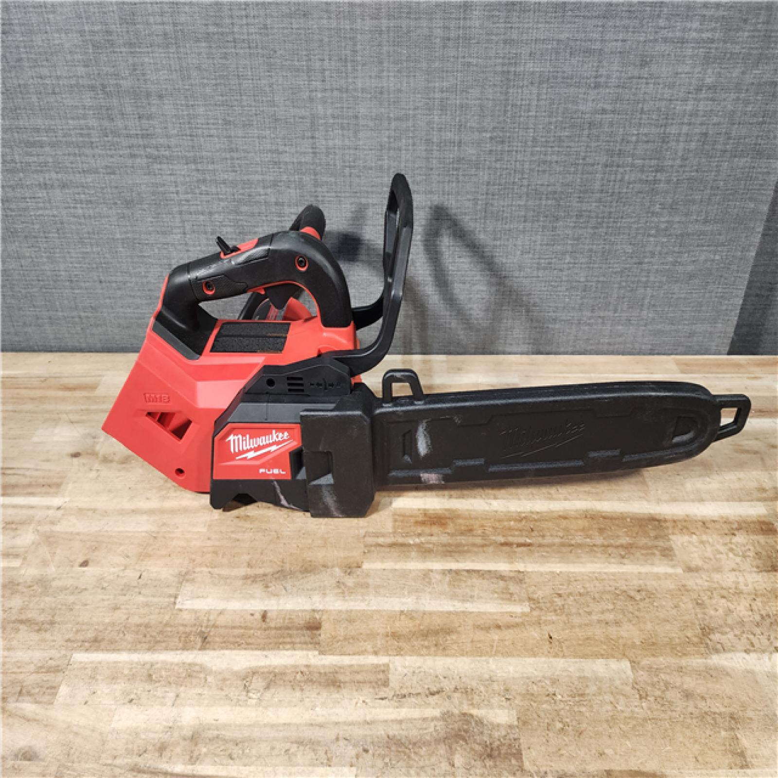 HOUSTON LOCATION - AS - IS Milwaukee FUEL 14 in. 18V Lithium-Ion Brushless Cordless Battery Top Handle Chainsaw (Tool Only)