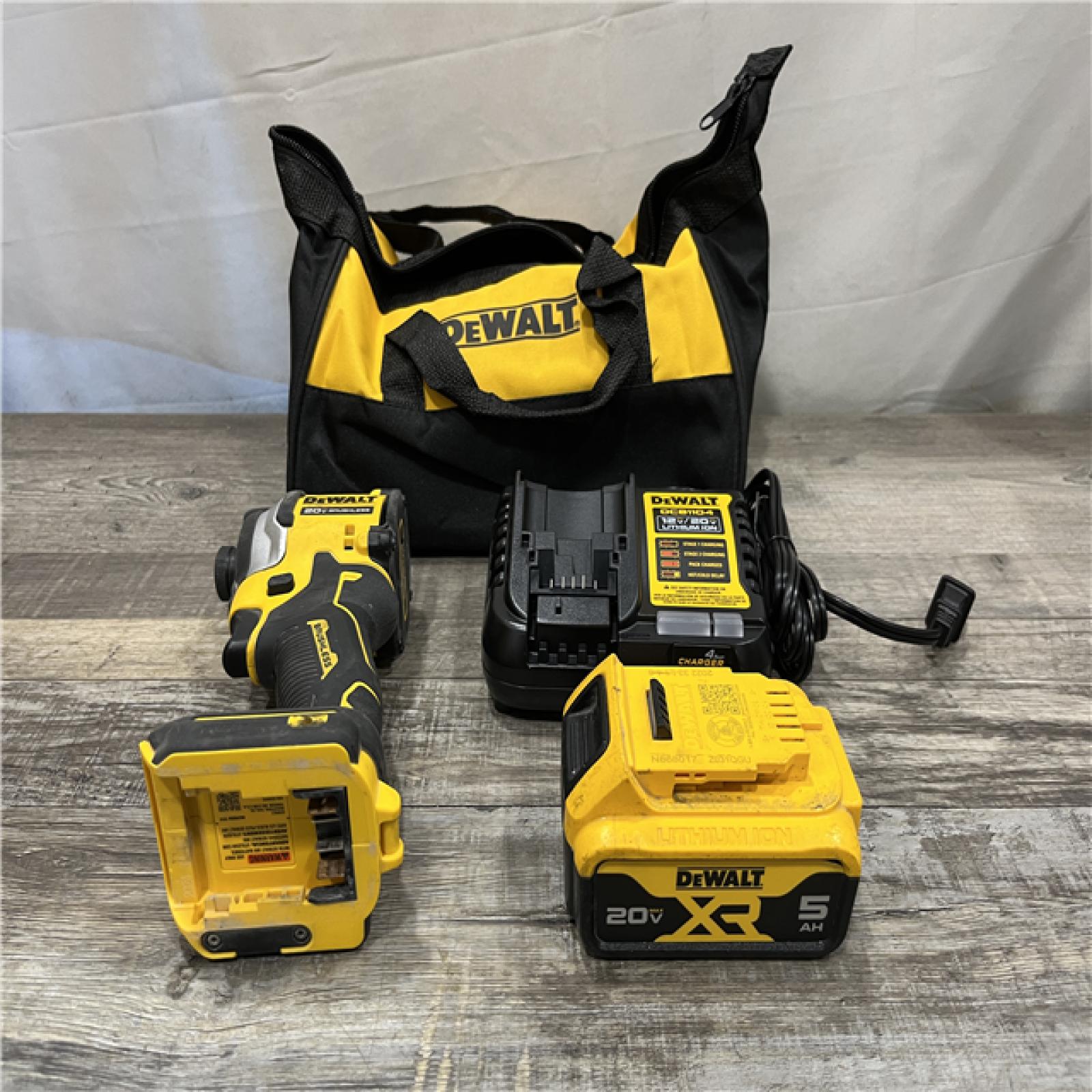 AS-IS DEWALT ATOMIC 20V MAX Lithium-Ion Cordless 1/4 in. Brushless Impact Driver Kit