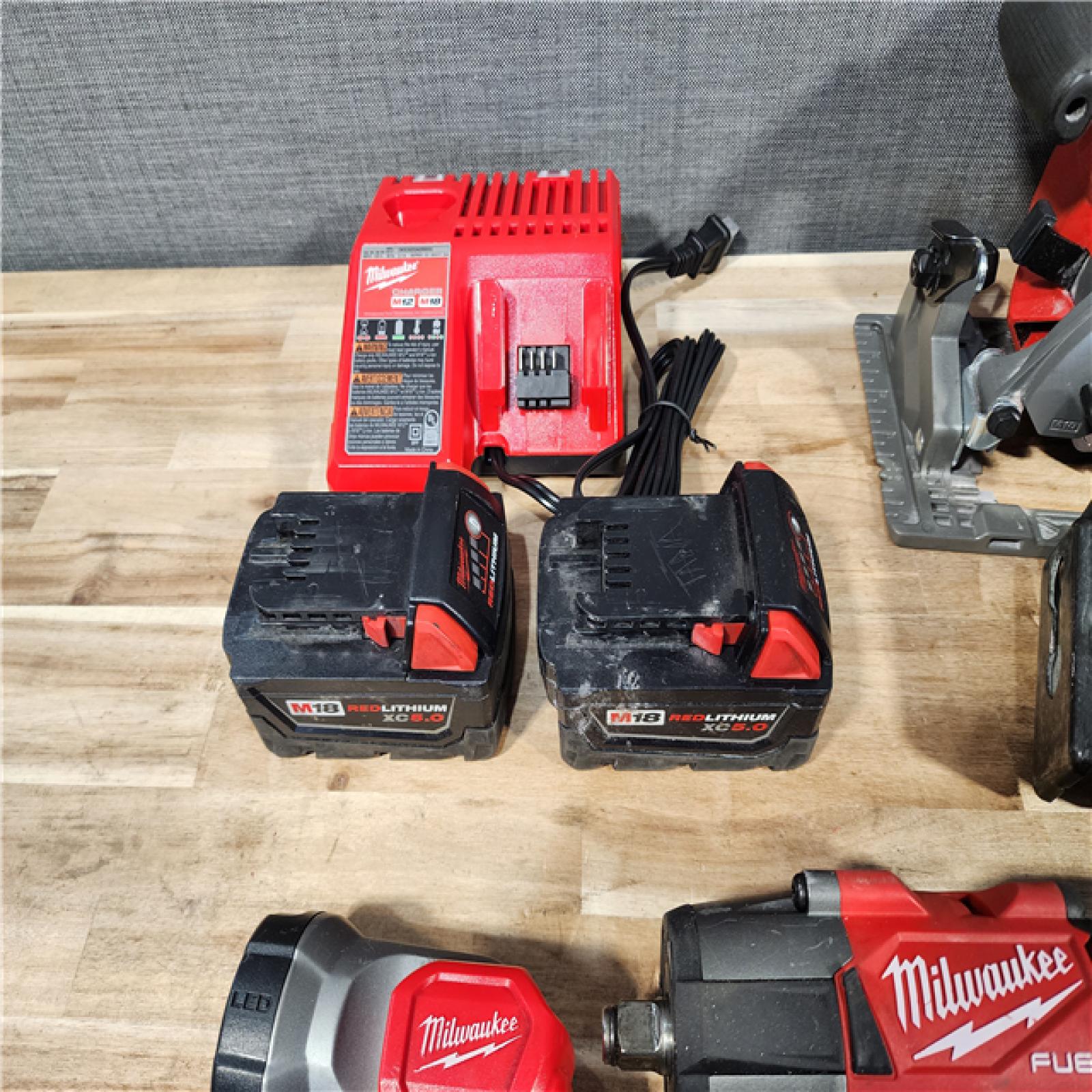HOUSTON LOCATION - AS-IS MILWAUKEE 6 TOOL COMBO KIT W/ (2) BATTERY & CHARGER
