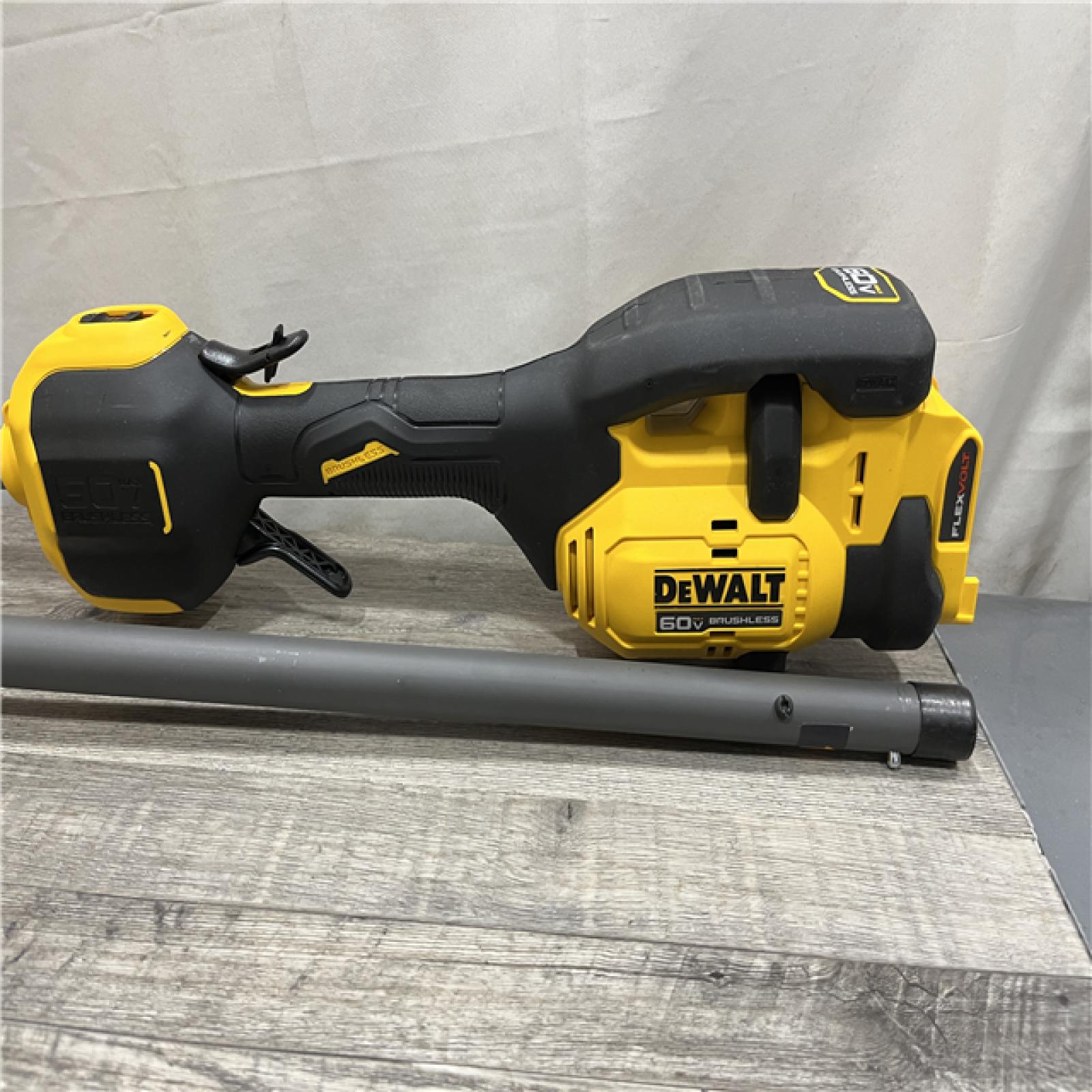 AS-IS DEWALT FLEXVOLT 60V MAX 17 in. Cordless Battery Powered Attachment Capable Trimmer Kit