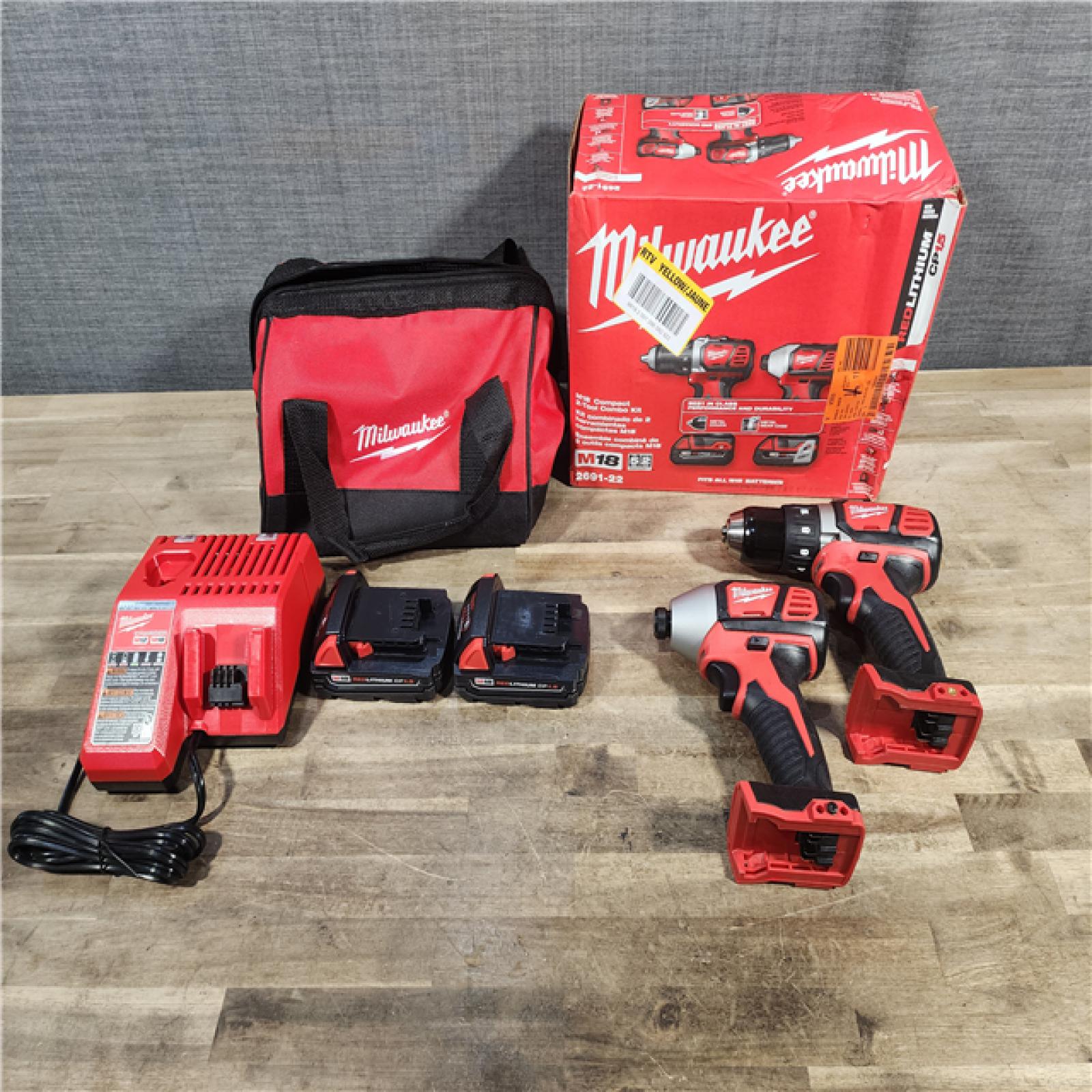 HOUSTON LOCATION - AS-IS Milwaukee 18V Cordless Brushed 2 Tool Drill/Driver and Impact Driver Kit