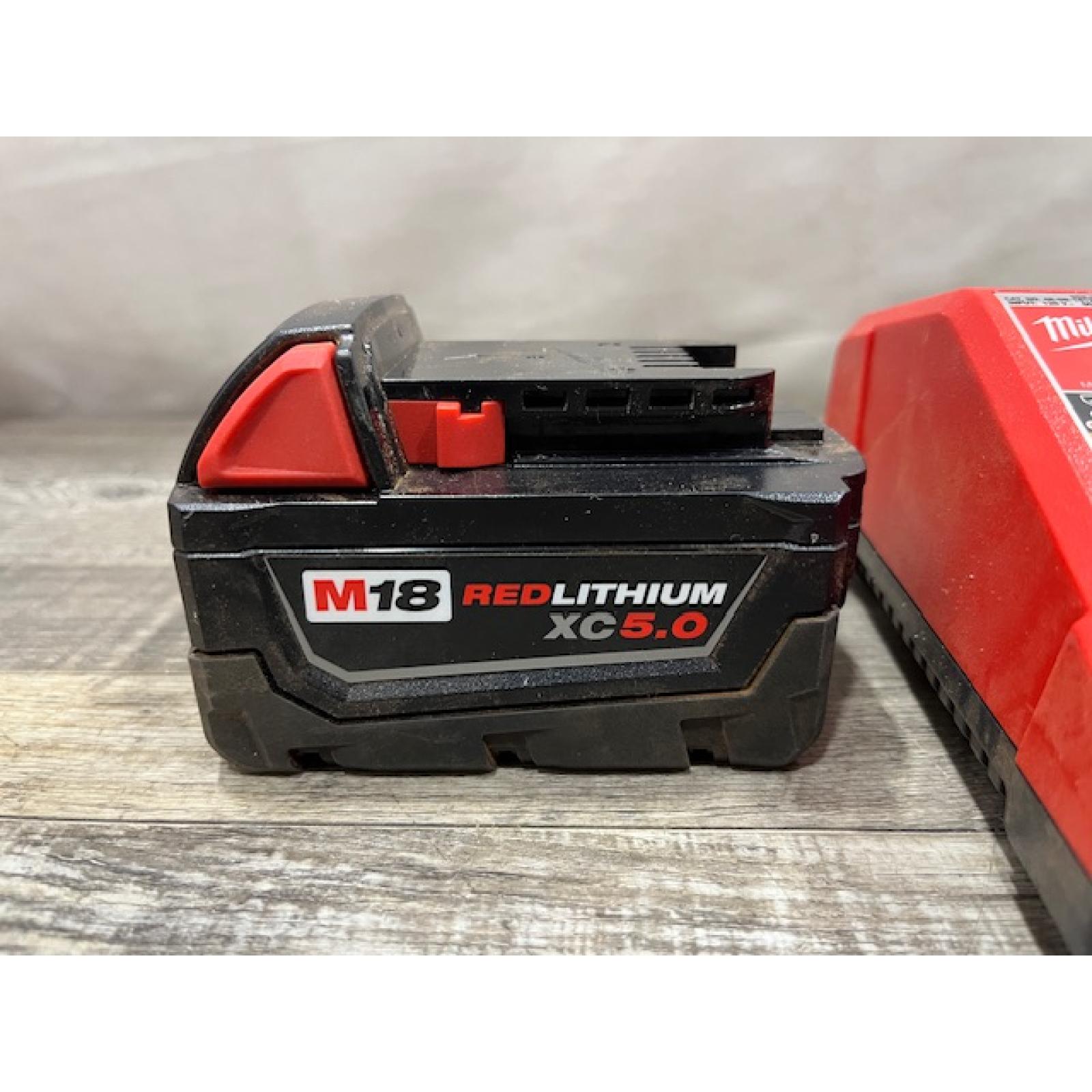 AS-IS Milwaukee 18-Volt Lithium-Ion XC Starter Kit with One 5.0Ah Battery and Charger