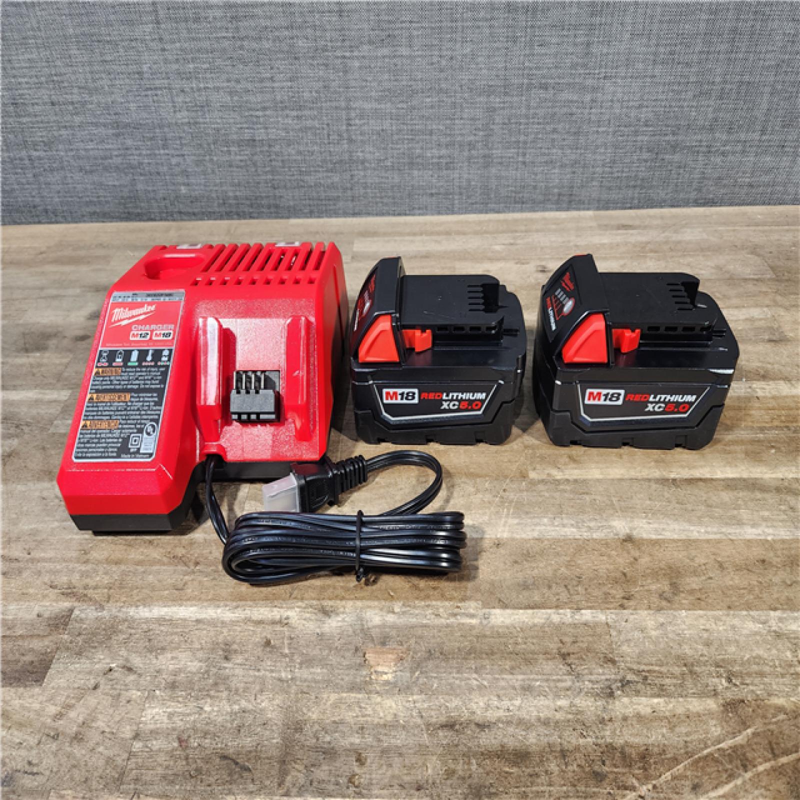 HOUSTON LOCATION - AS-IS (APPEARS LIKE NEW) Milwaukee 18V Lithium-Ion Brushless Cordless Hammer Drill and Impact Driver Combo Kit