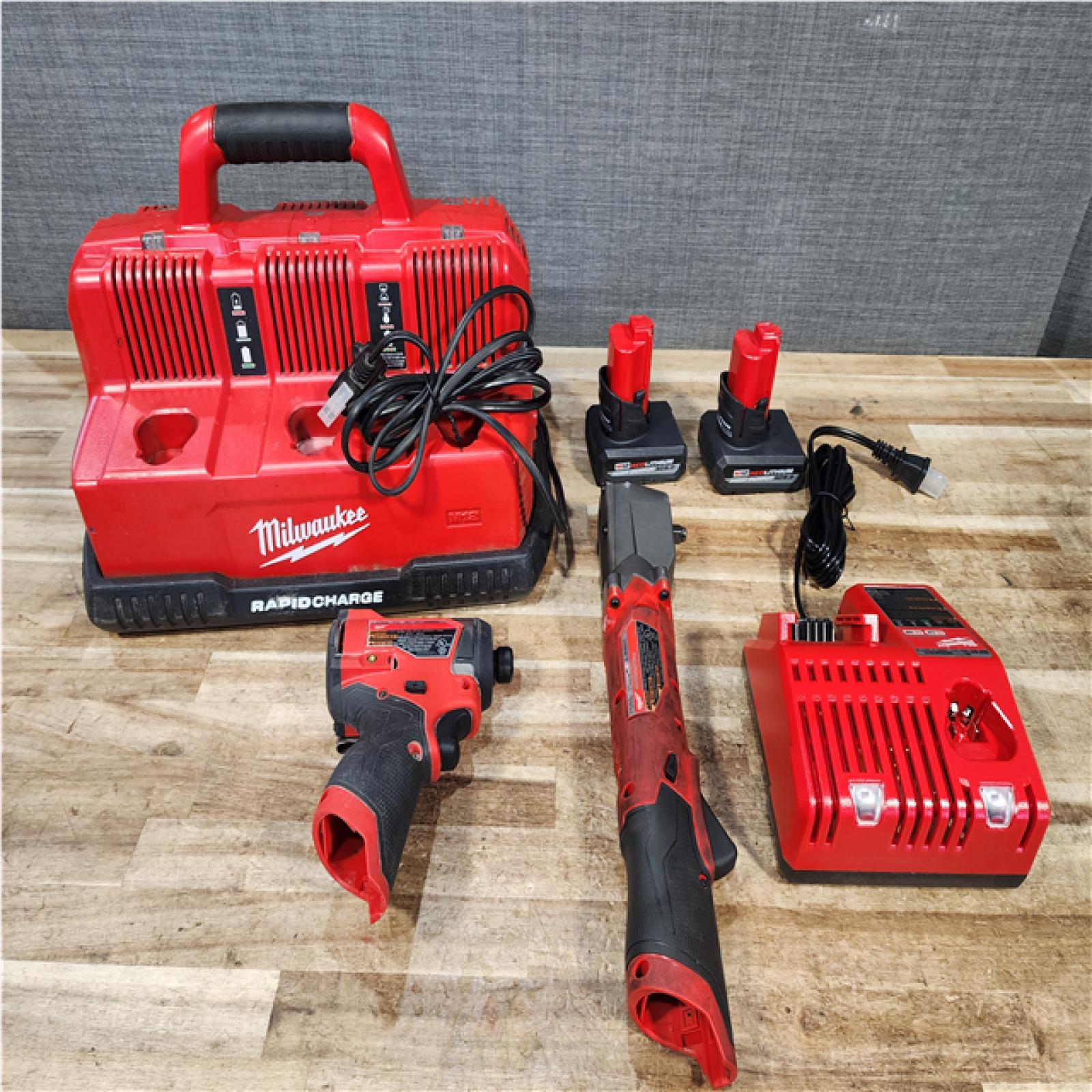 Houston Location AS-IS Milwaukee Impact and Electric Ratchet and Rapid Charger and Batteries QTY/2 with Charger