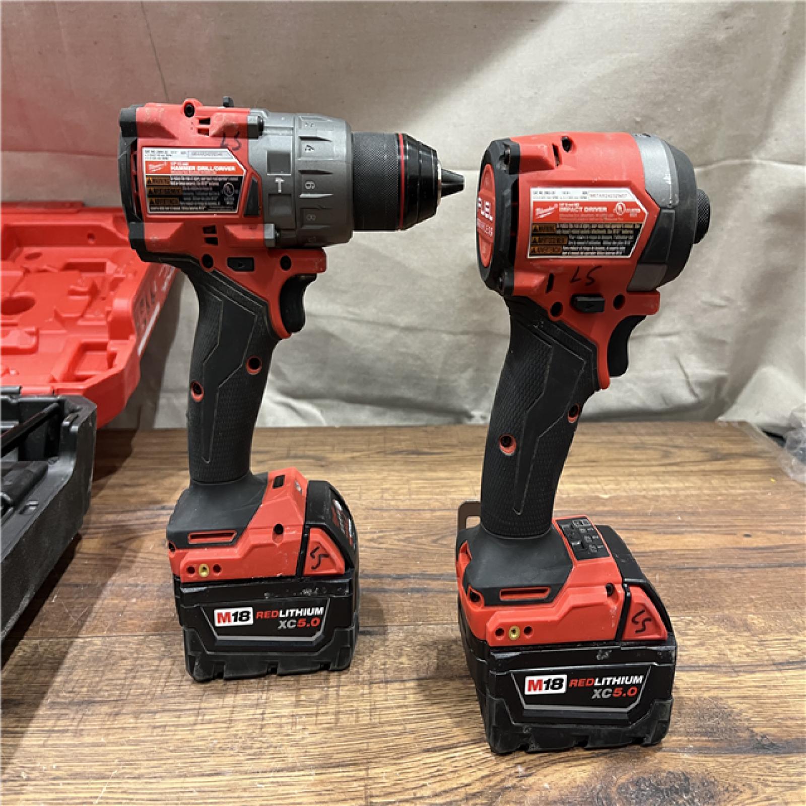 AS-IS Milwaukee M18 FUEL 18V Lithium-Ion Brushless Cordless Hammer Drill and Impact Driver Combo Kit (2-Tool) with 2 Batteries
