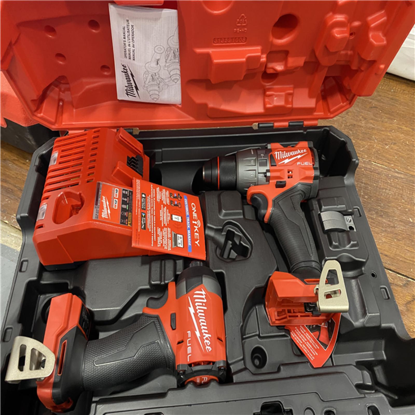 AS-IS MILWAUKEE M18 FUEL 18V Lithium-Ion Brushless Cordless Hammer Drill and Impact Driver Combo Kit (2-Tool) with 2 Batteries