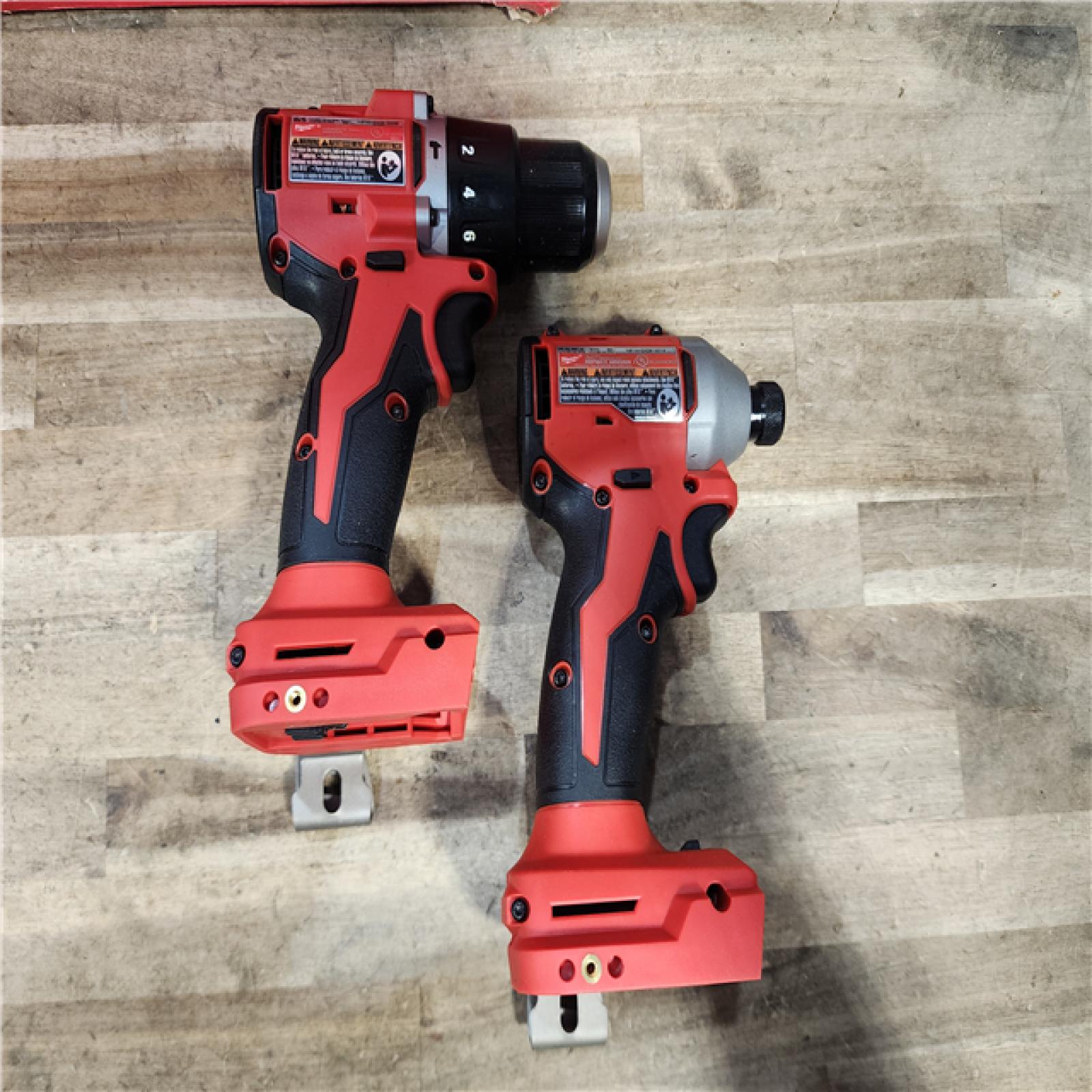 HOUSTON LOCATION - AS-IS M18 18-Volt Lithium-Ion Brushless Cordless Compact Hammer Drill/Impact Combo Kit (2-Tool) with (2) Batteries  Bag